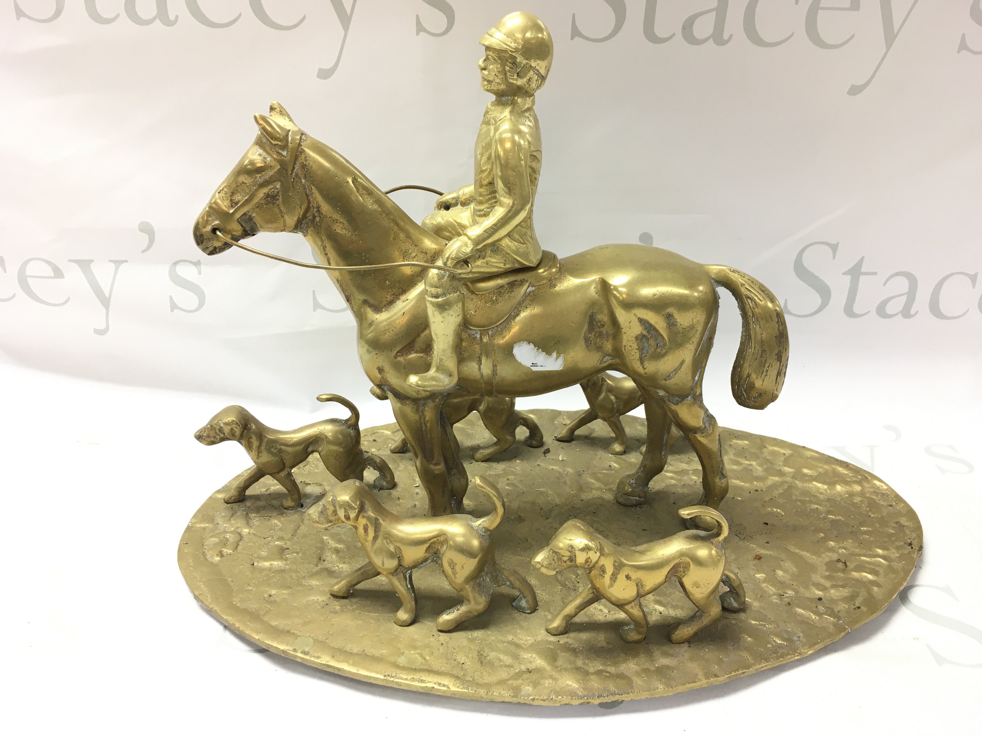 A Brass Figurine Depicting A Hunting Scene. Approximate Height 30CM. Length 45CM.