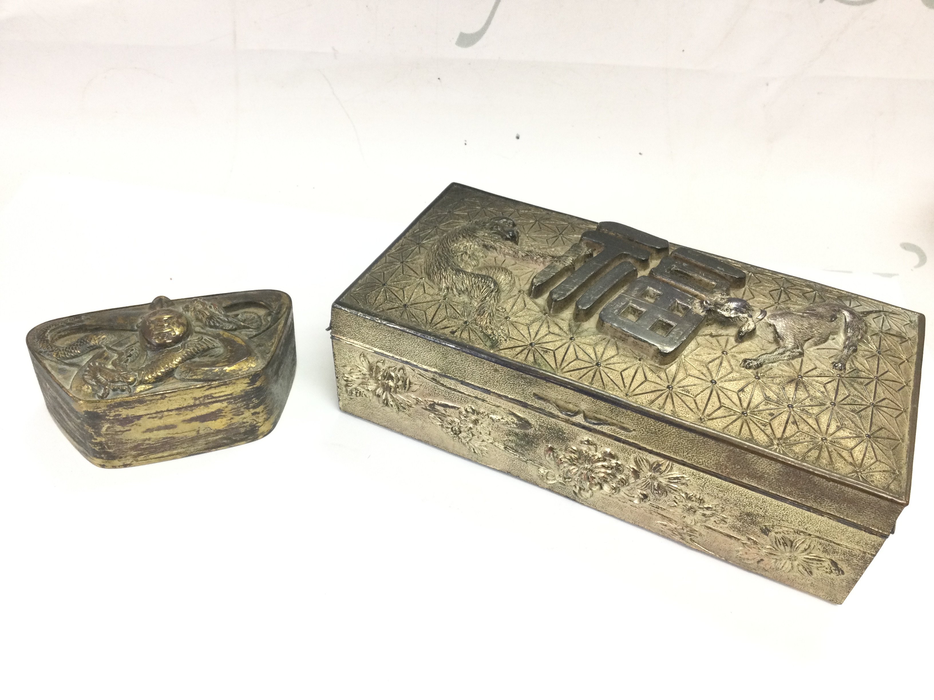 Chinese trinket box featuring Monkey and dog design (length 9cm width 18cm height 6cm) with a Chinese character and a smaller Chinese brass dragon trinket box . Postage category B