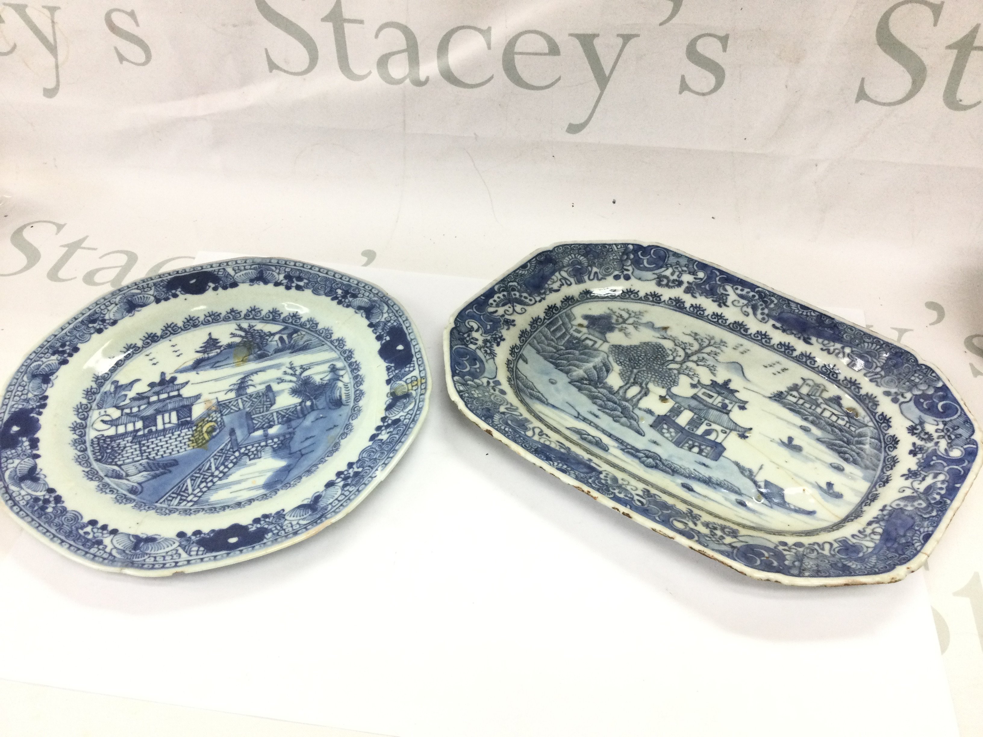 Chinese blue and white porcelain dishes with river scene designs, damage and hairline cracks . This lot cannot be posted