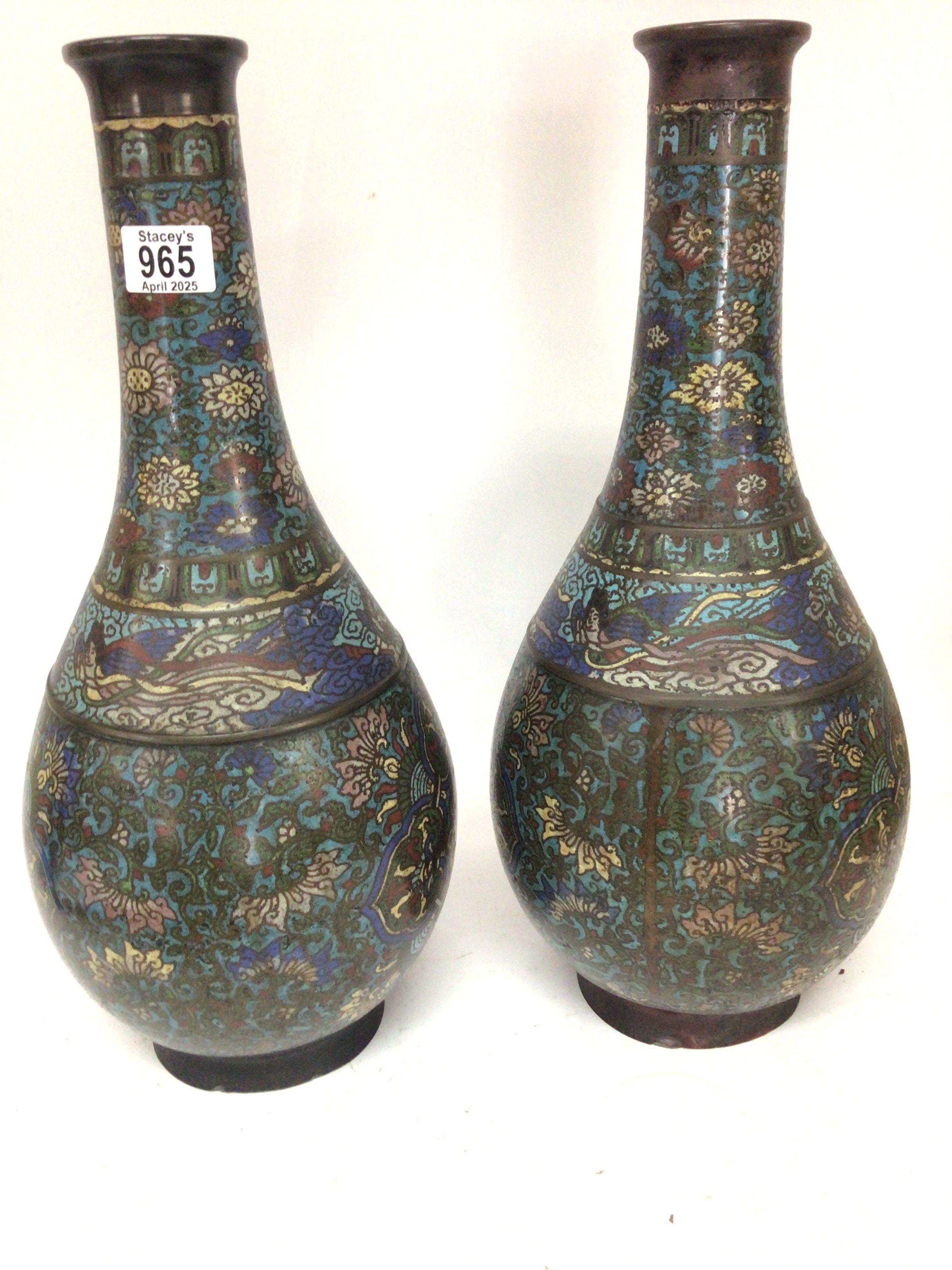 A pair of large 19th century Chinese bronze and cloisonn̩ bottle vases with a floral pattern and signed basis height 48cm