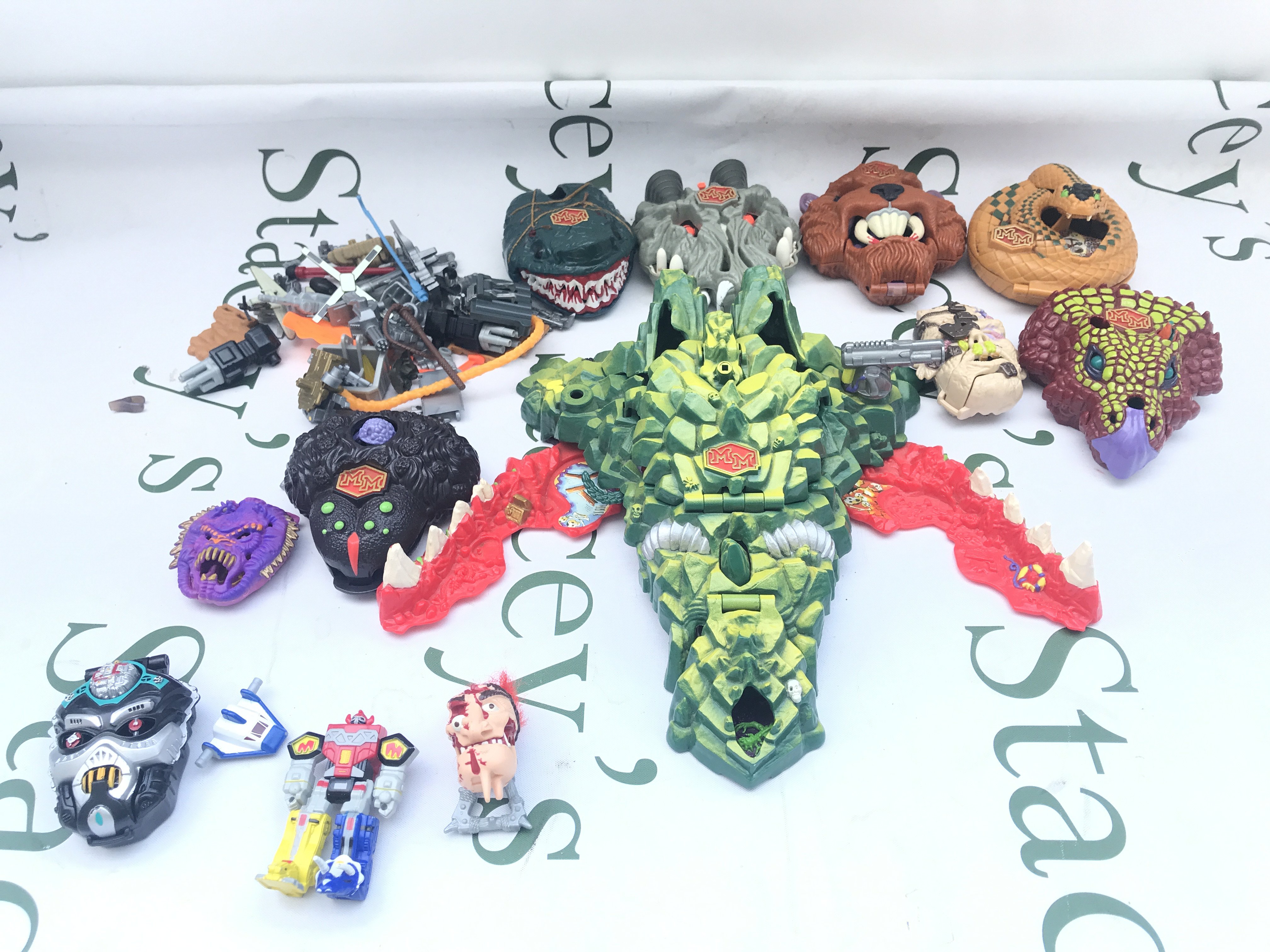 A Box Containing Mighty Max Playsets.