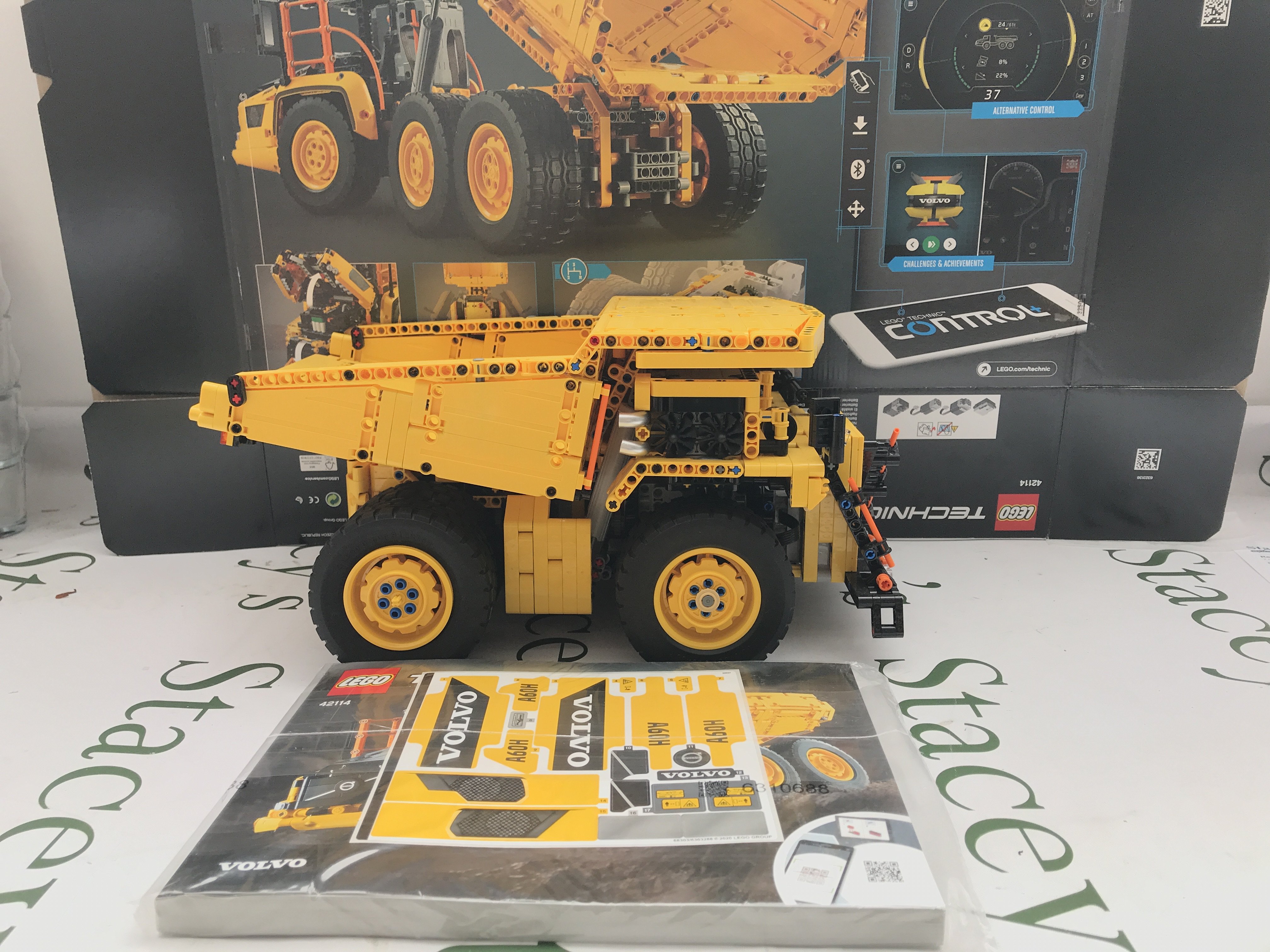 A Lego 6X6 Volvo Truck Articulated Hauler #4211.Has Been Built into A Tipper Truck. With Box And Manual. Appears to Be Complete. This Lot Cannot Be Posted In House. (2).