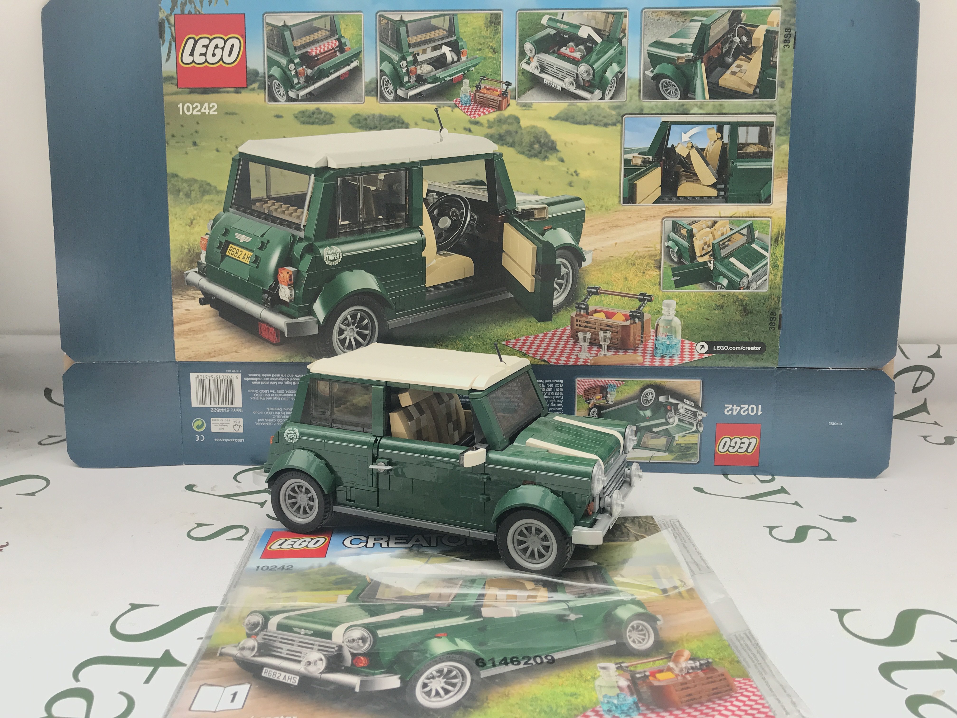 A Lego Mini Cooper #10242 With Box And Manual. Appears Complete. This Lot Cannot Be Posted In House. (2).