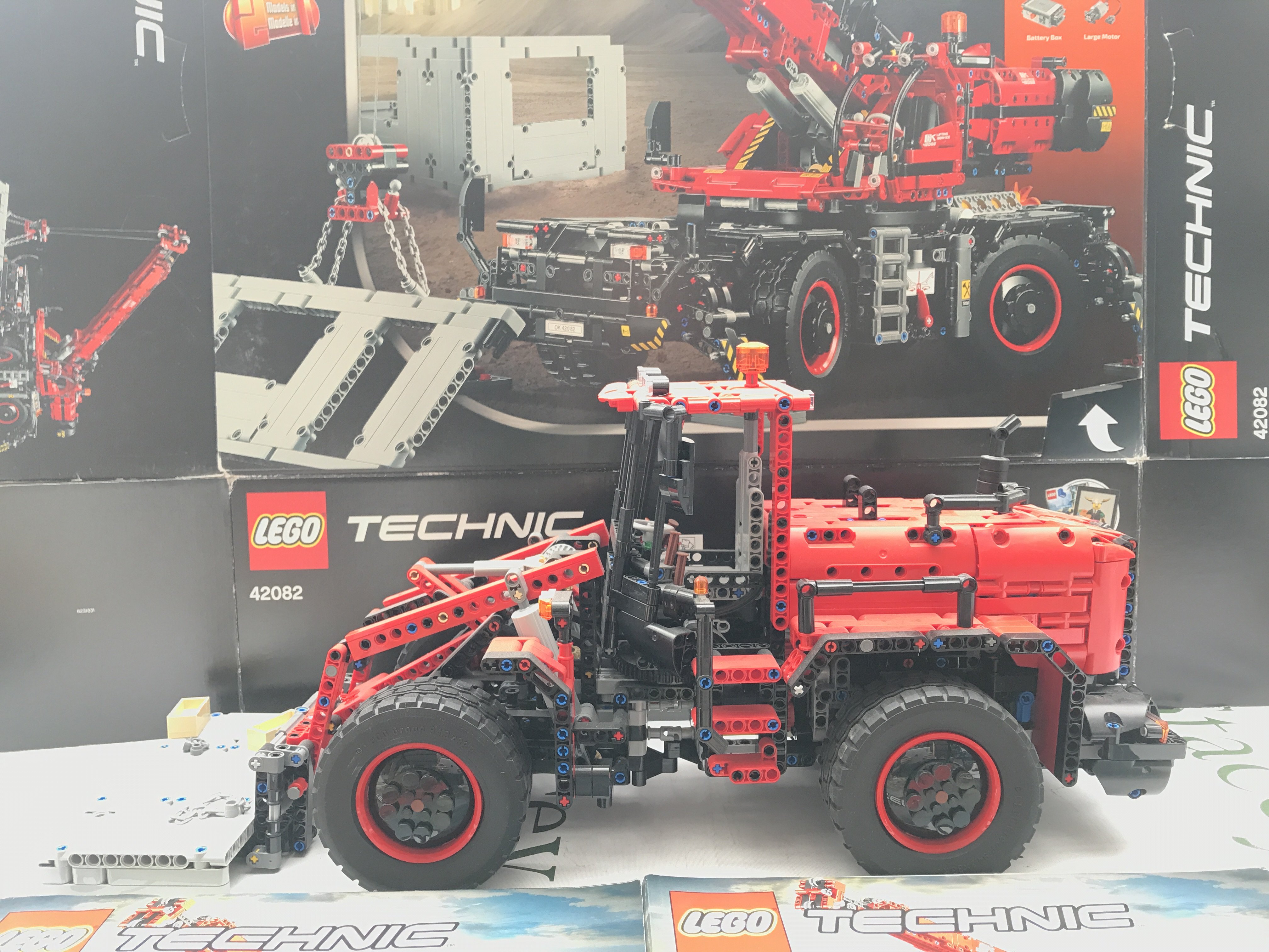 A Lego Rough Terrain Crane #42082. With Box And Manual. Been turned Into A Loader. Appears Complete. This Lot Cannot Be Posted In House.(2).