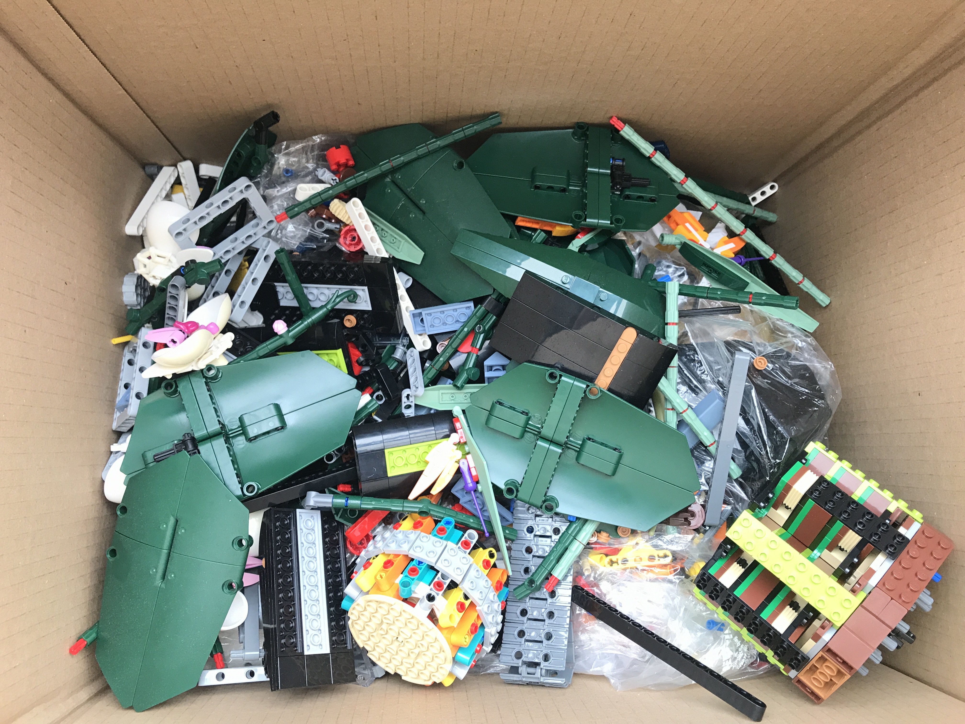 A Box Containing Loose Lego. No Reserve.