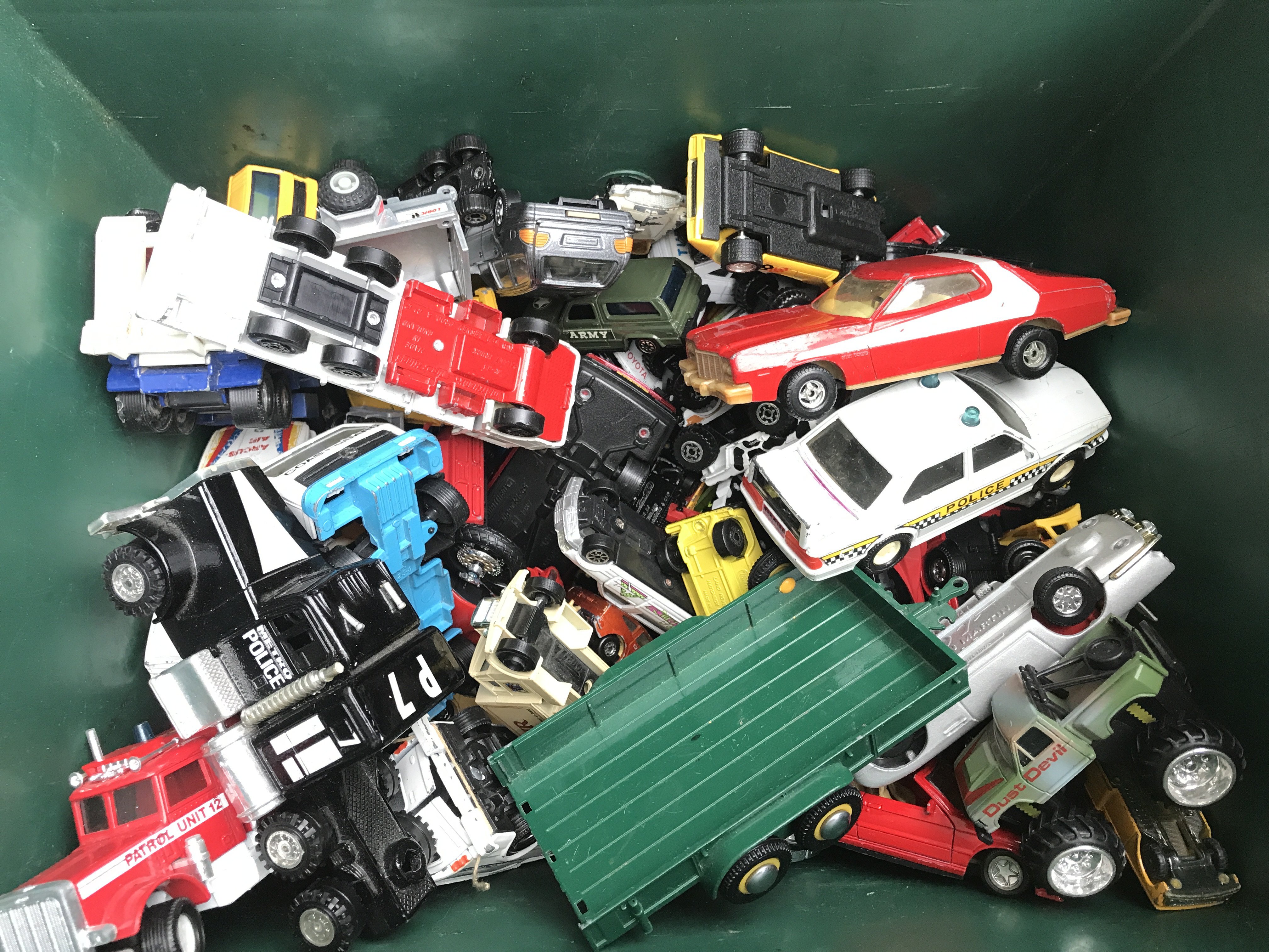 A Box Containing playworn Diecast. Including Corgi. No Reserve.