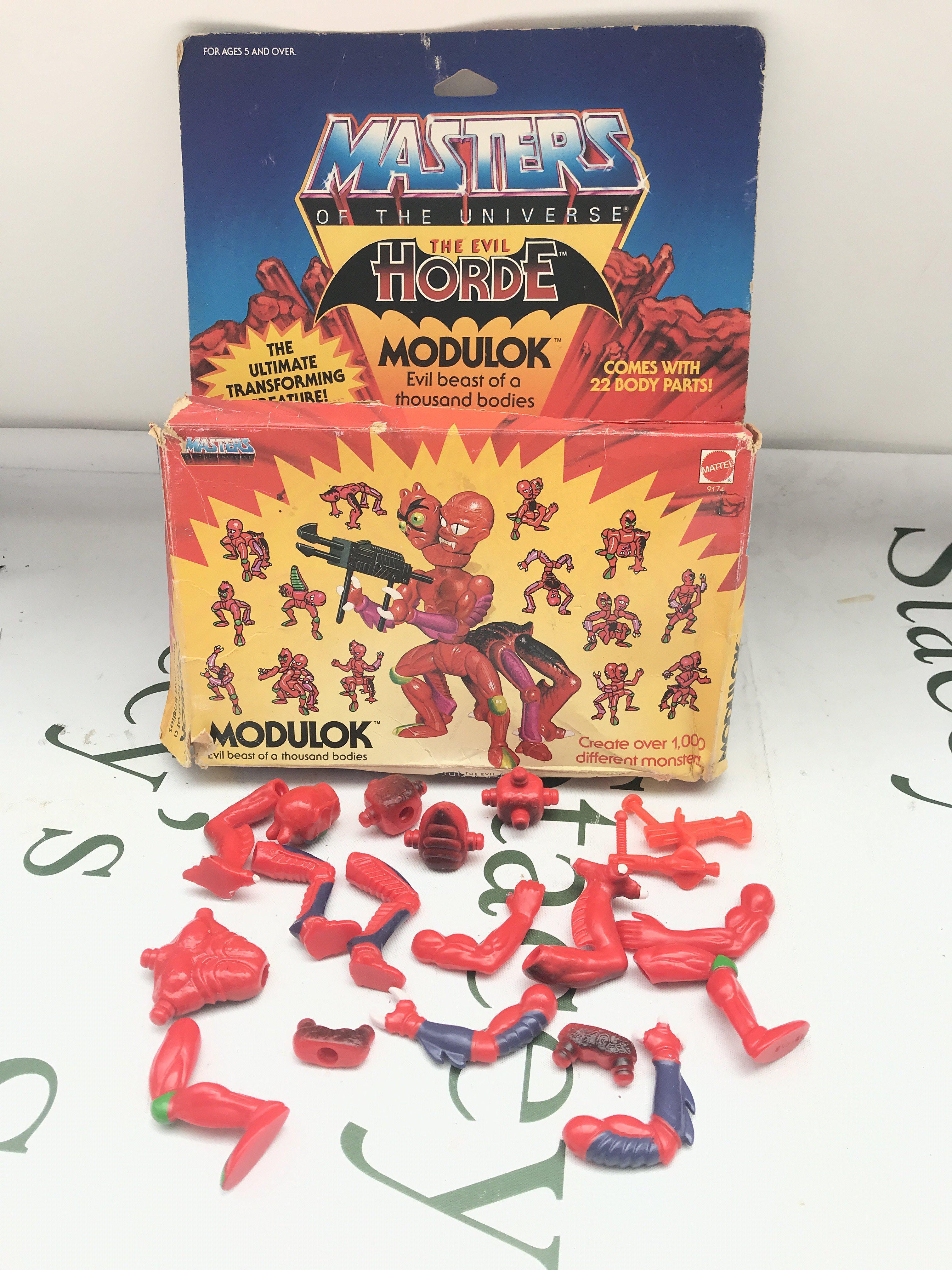 A Boxed Vintage Masters Of The Universe Modulk. Box Is Worn And Parts Missing. No Reserve.