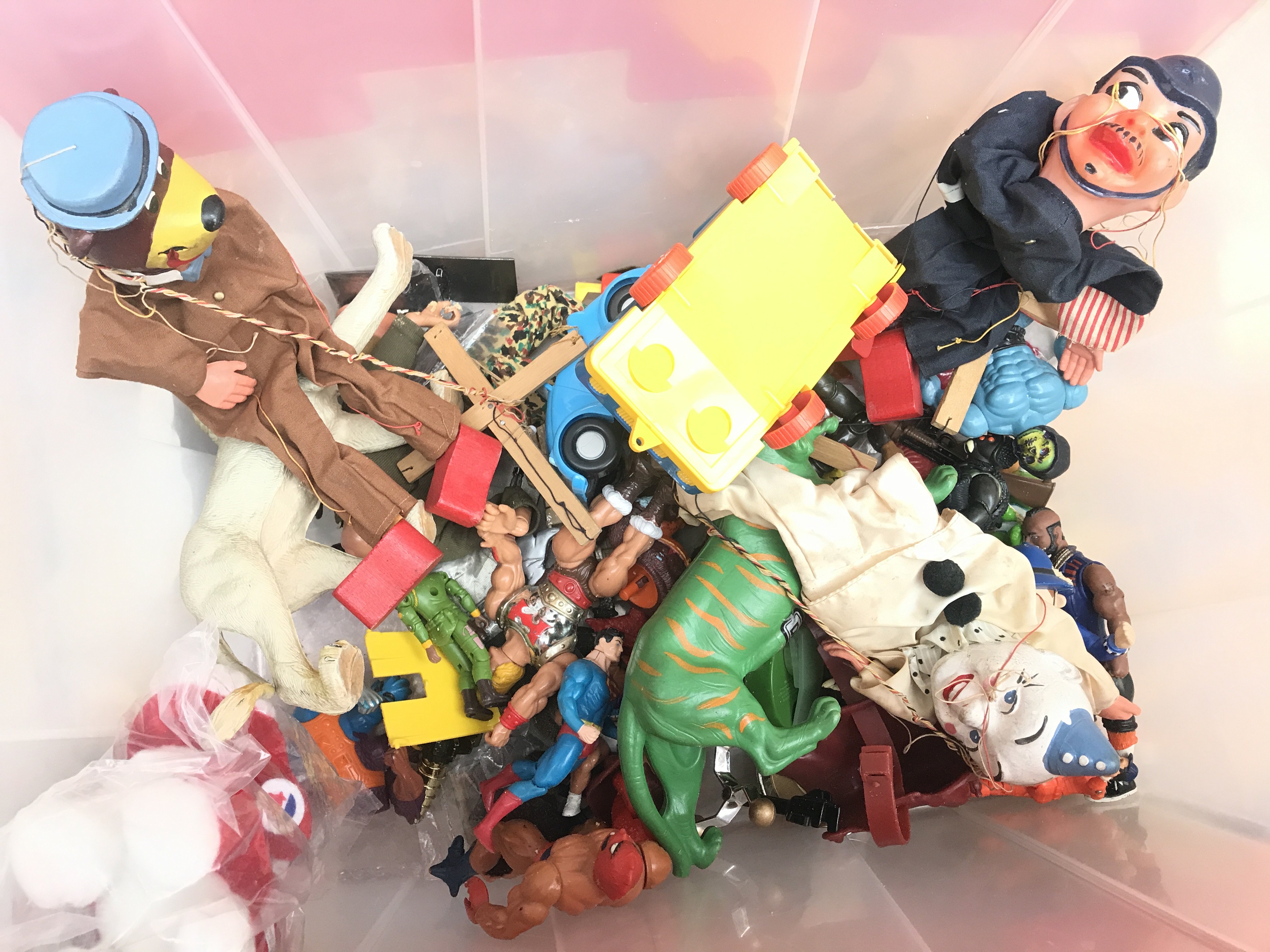 A Box Containing Playworn Toys. Includes The A-Team. Masters Of The Universe. Teenage Mutant Hero Turtles. Pelham Puppets. Etc.