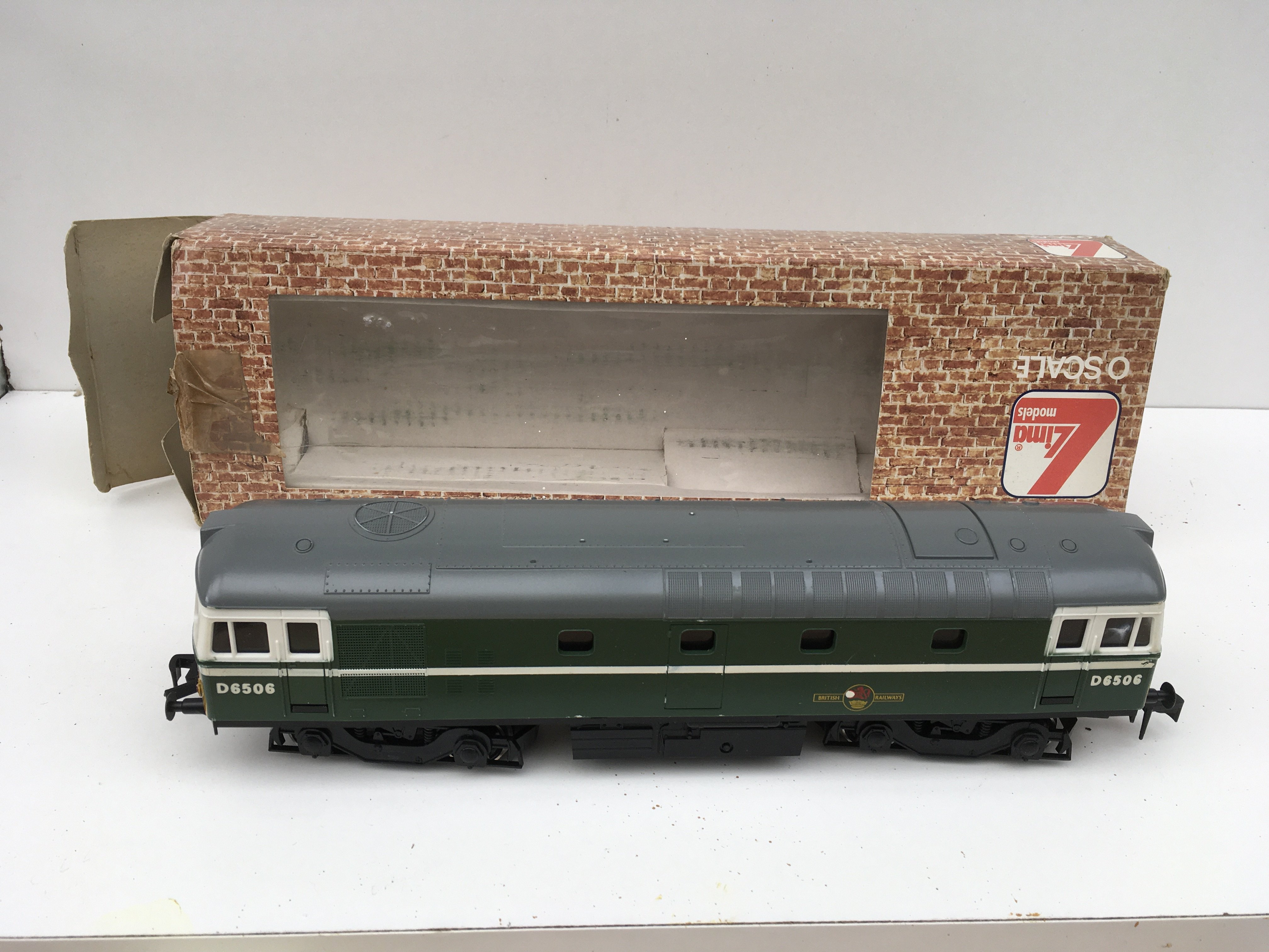 A boxed model railway locomotive 0 gauge. No 21 6576 G. In British Railways green. No reserve