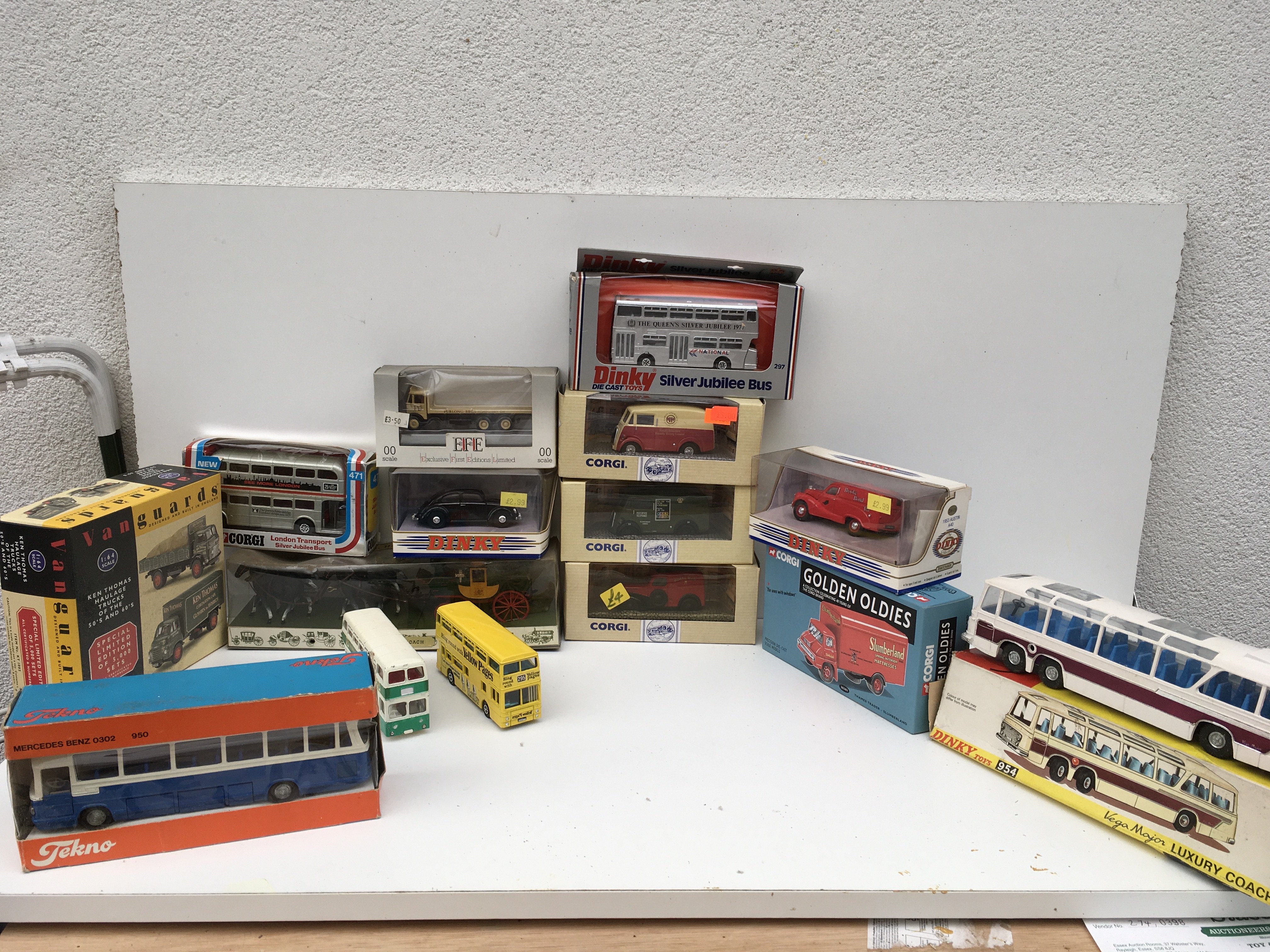 A collection in excess of 12 mostly boxed model diecast vehicles featuring commercials and buses manufacturers include Dinky..Corgi..Tekno.. no reserve