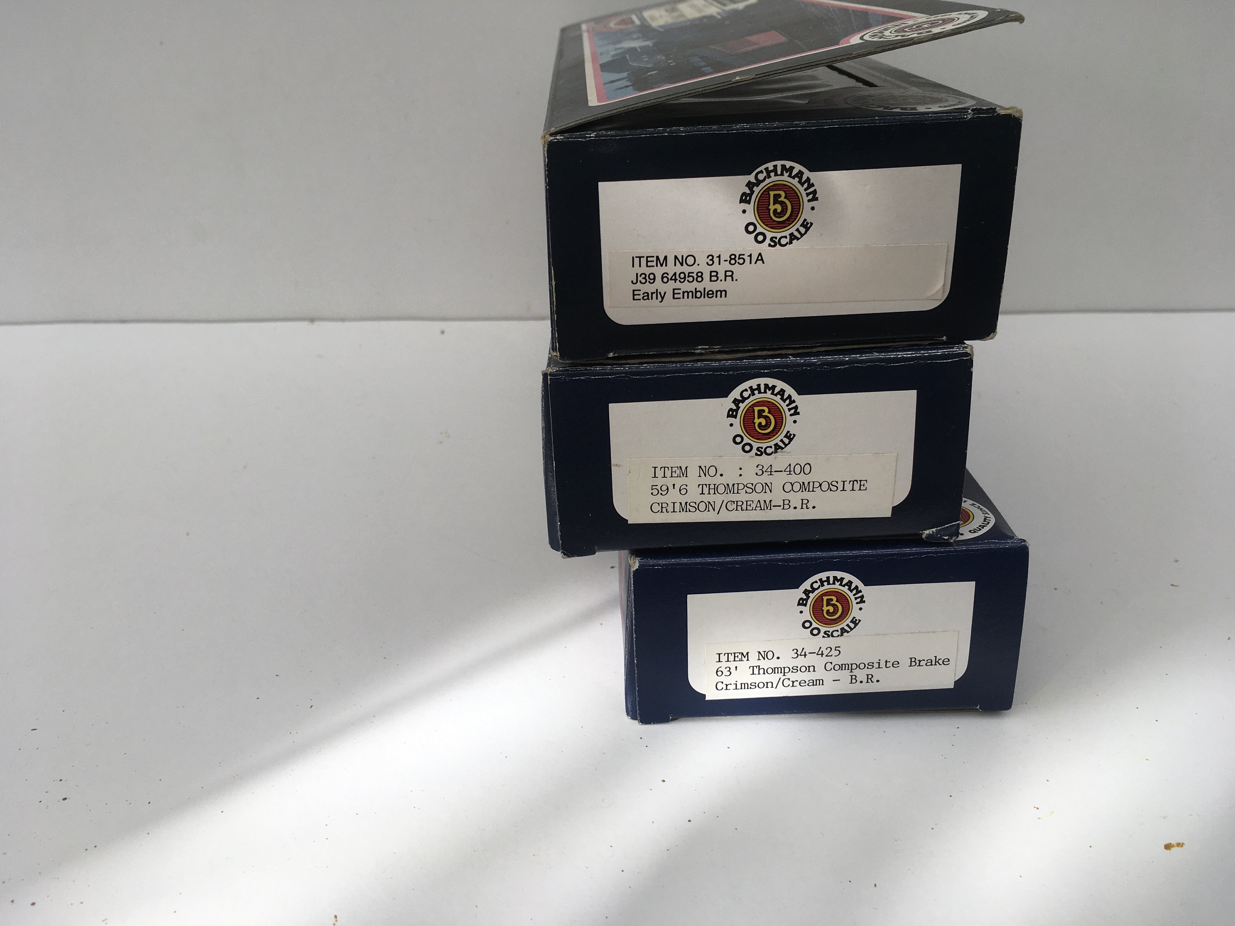 3x boxed Bachmann 00gauge model railway items including a Greeley J39 class locomotive and 2x composite coaches 34..400 and 34..425. No reserve