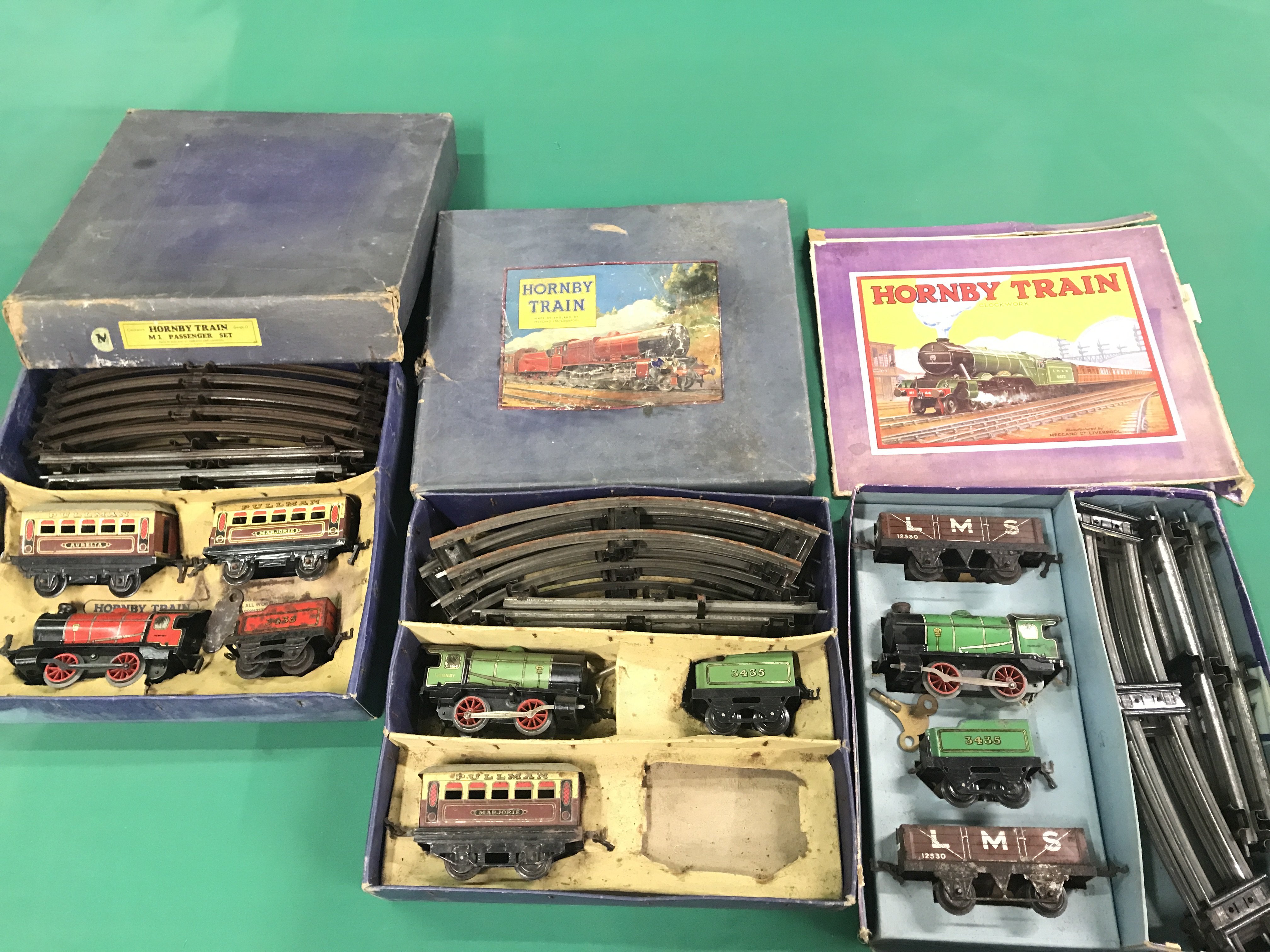 3 Boxed Hornby 0 Gauge Sets. Boxes Are Worn. (3).
