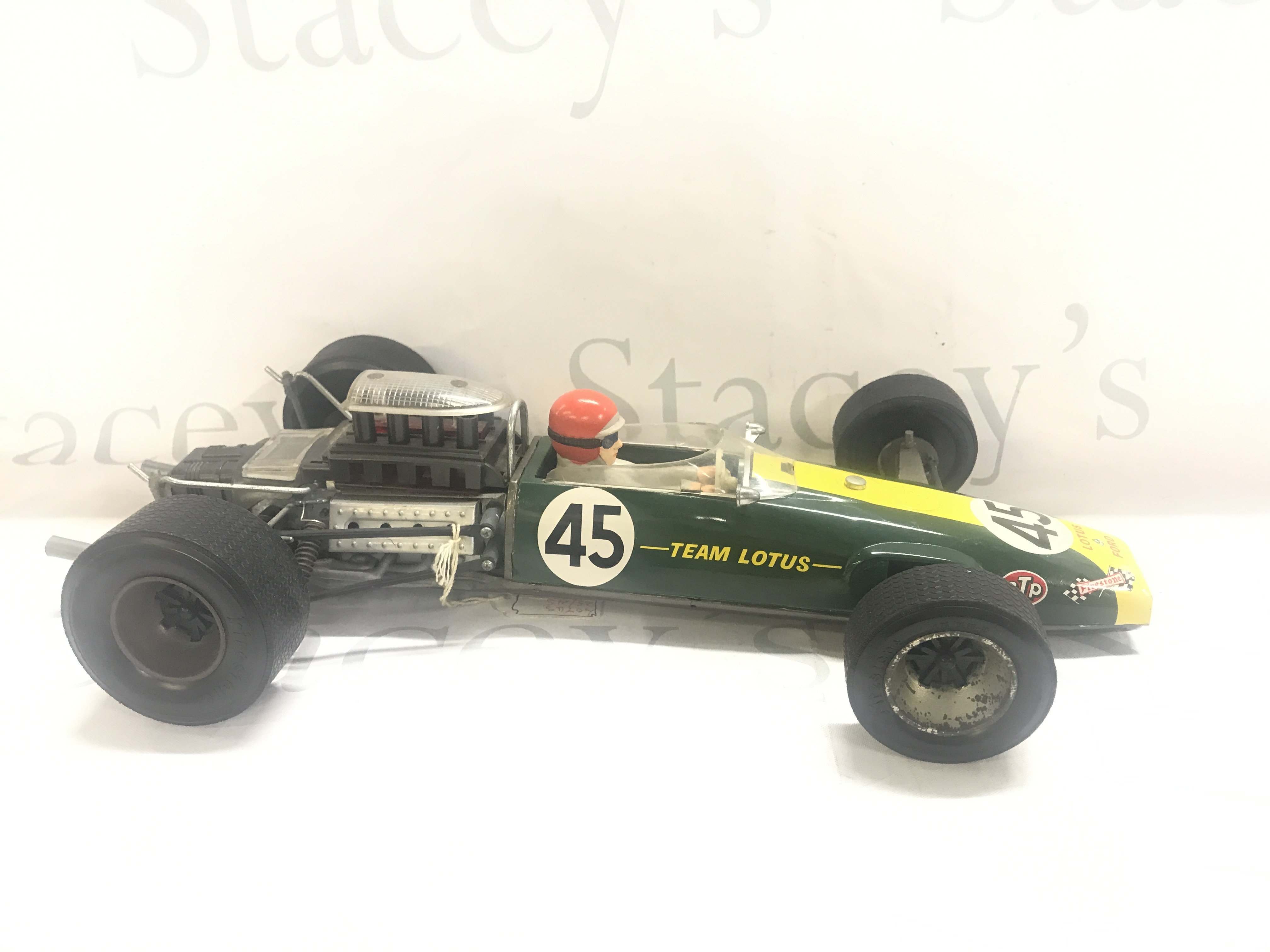 A Tinplate Battery Operated Japanese Made Model Of A Lotus 49 Ford F-1 Racing Car.