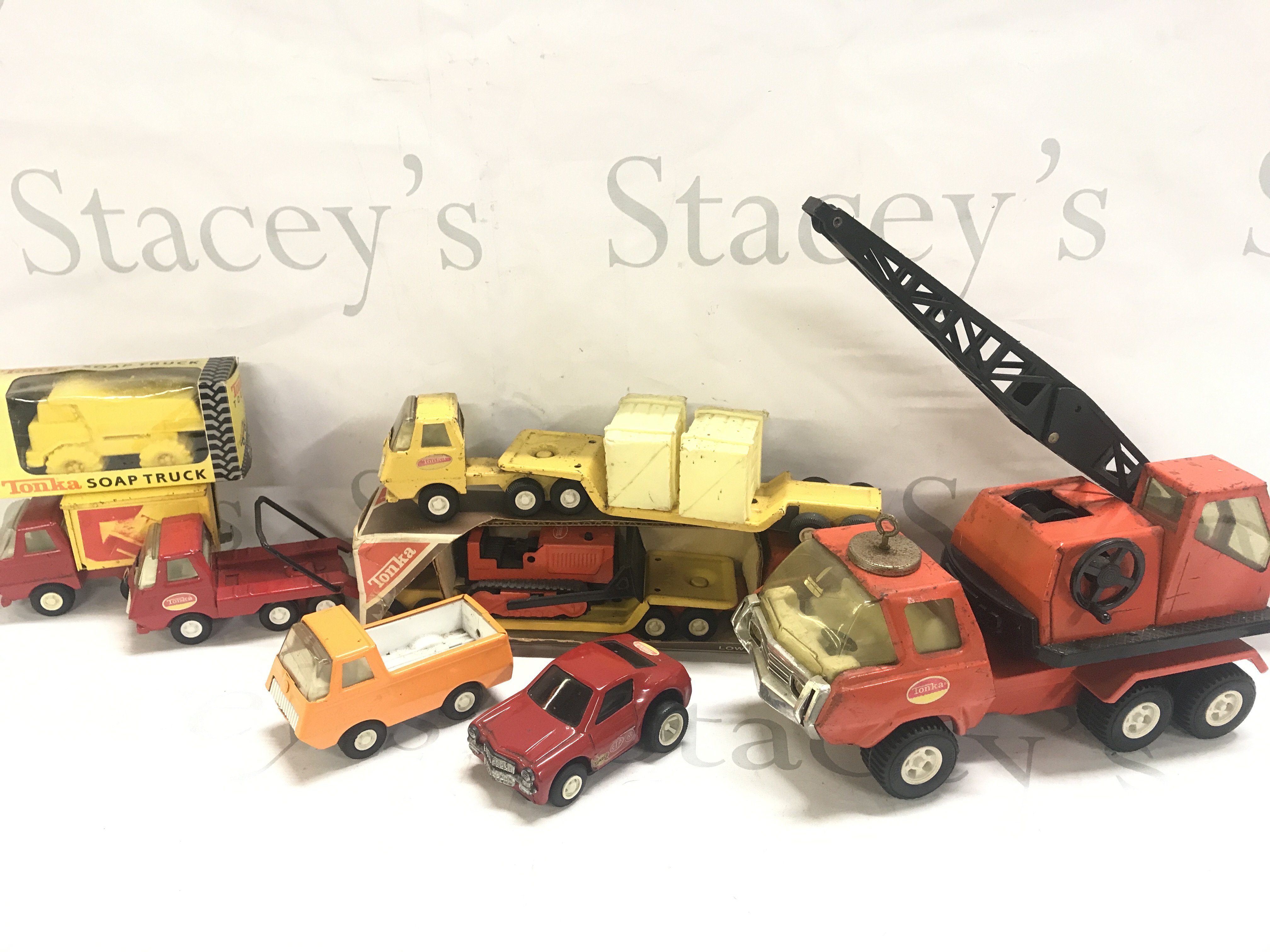 A Collection Of Various Vintage Tonka Toys. Some Boxed. Including A Car Carrier.