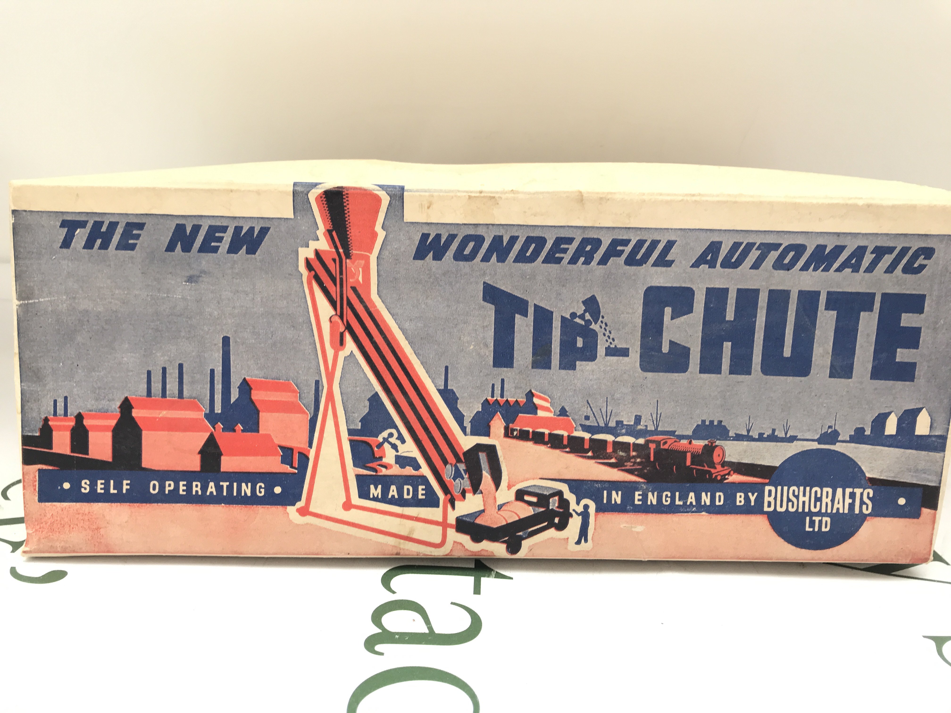 A Boxed Bushcrafts Tinplate Tip-Chute.