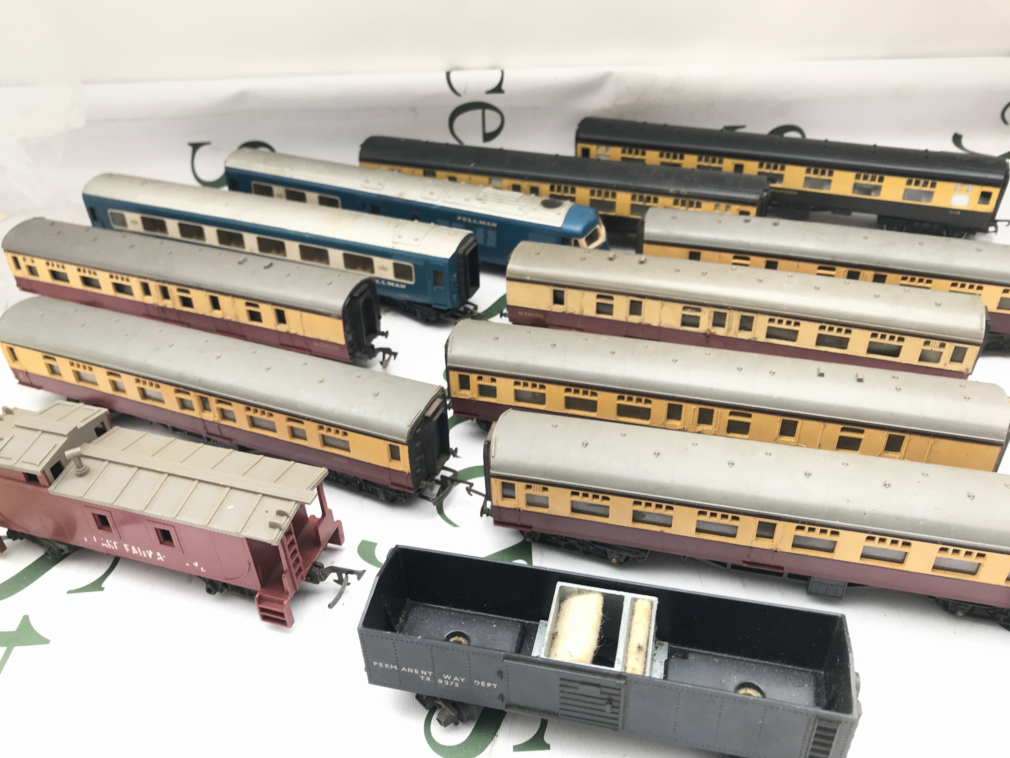 Withdrawn - A Box Containing Loose 00 Gauge Wagons And Coaches.