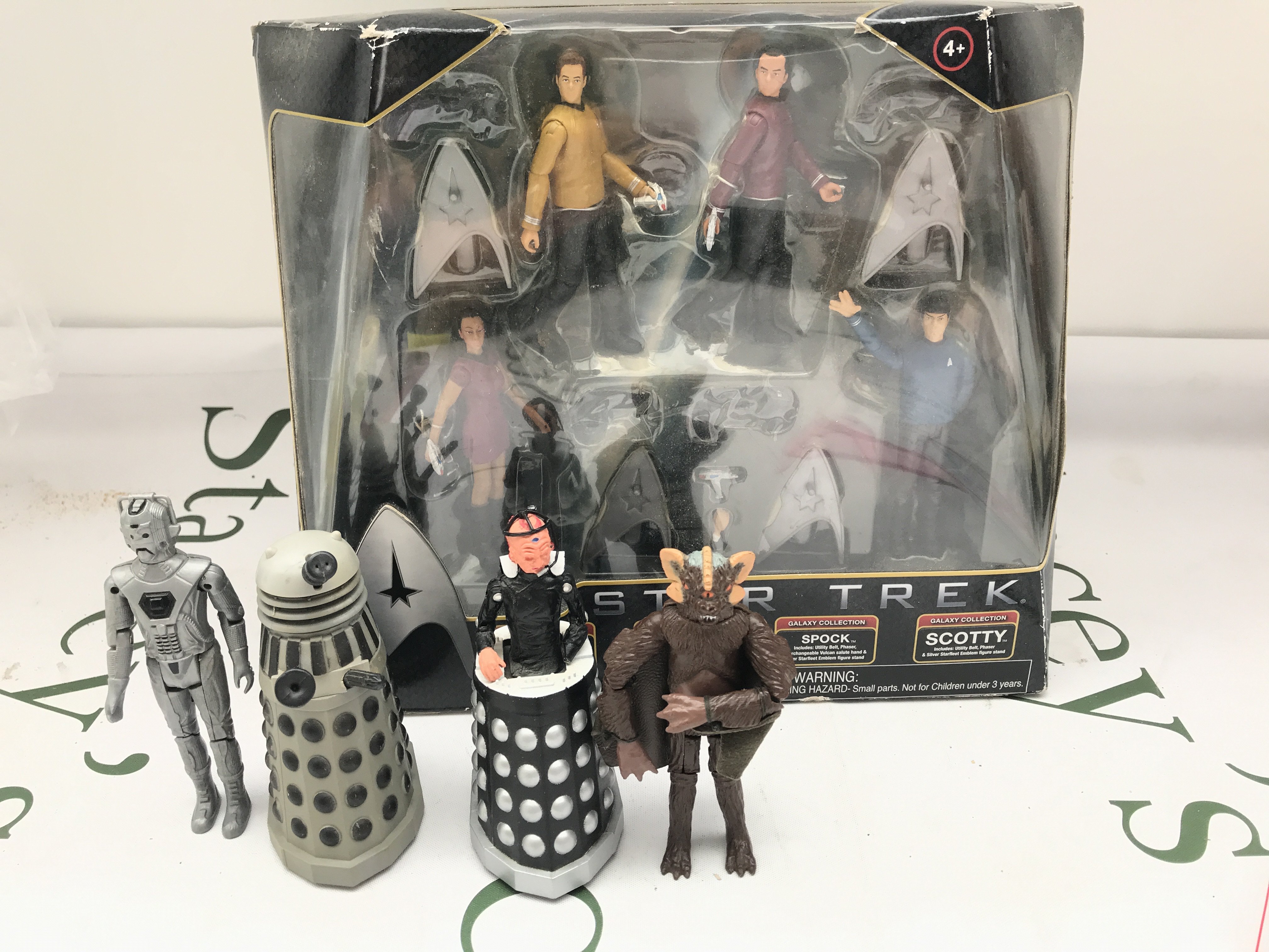 A Boxed Star Trek Figure Set And 4 Dapol Doctor Who Figures.