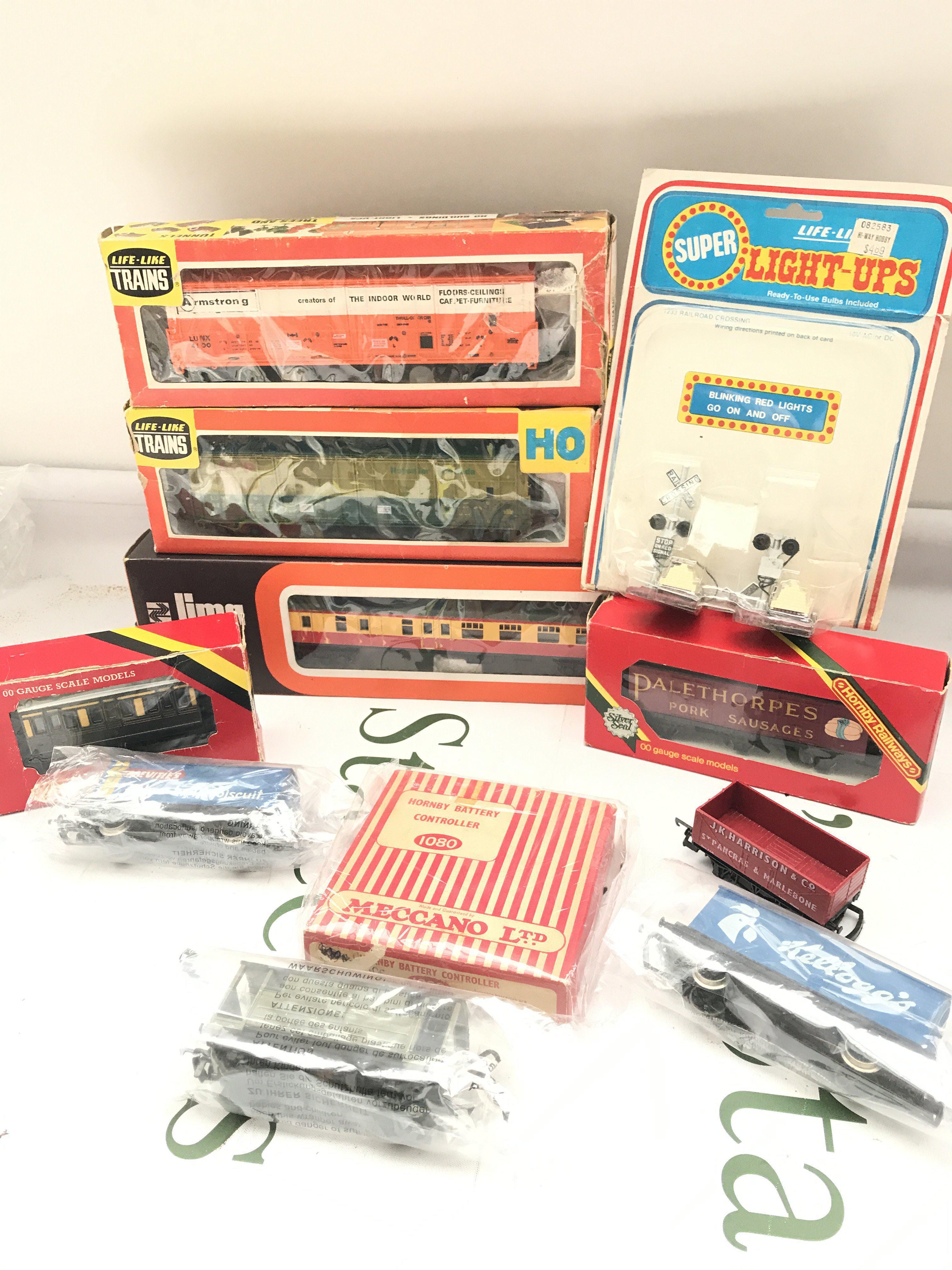 A Small Collection Of Boxed And Loose 00/H0 Wagons. Coaches And Accessories. No Reserve.