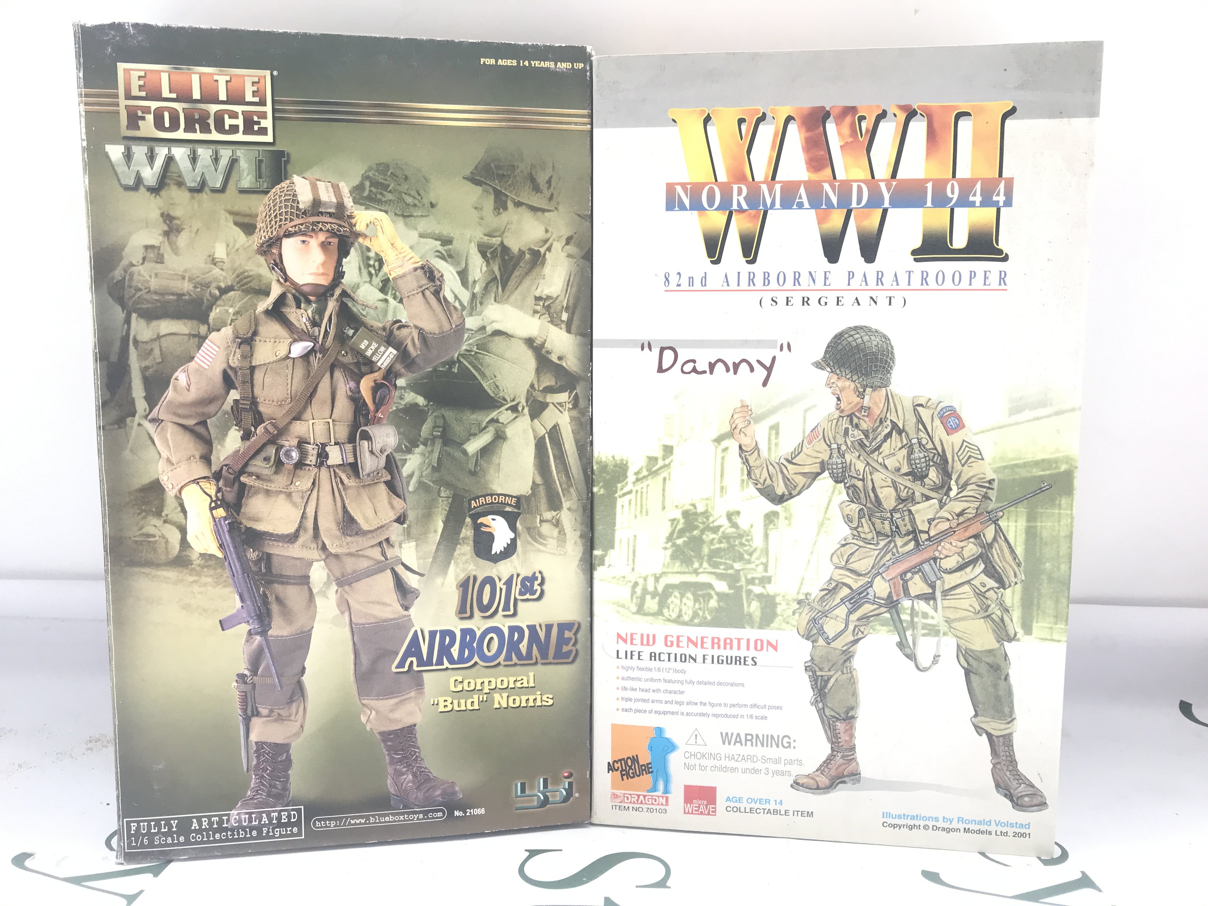 2 X Boxed Military Figures. A Blue Box Toys 101st Airborne Corporal Bud Norris And A Dragon Models 82ND Airborne Danny. No Reserve.
