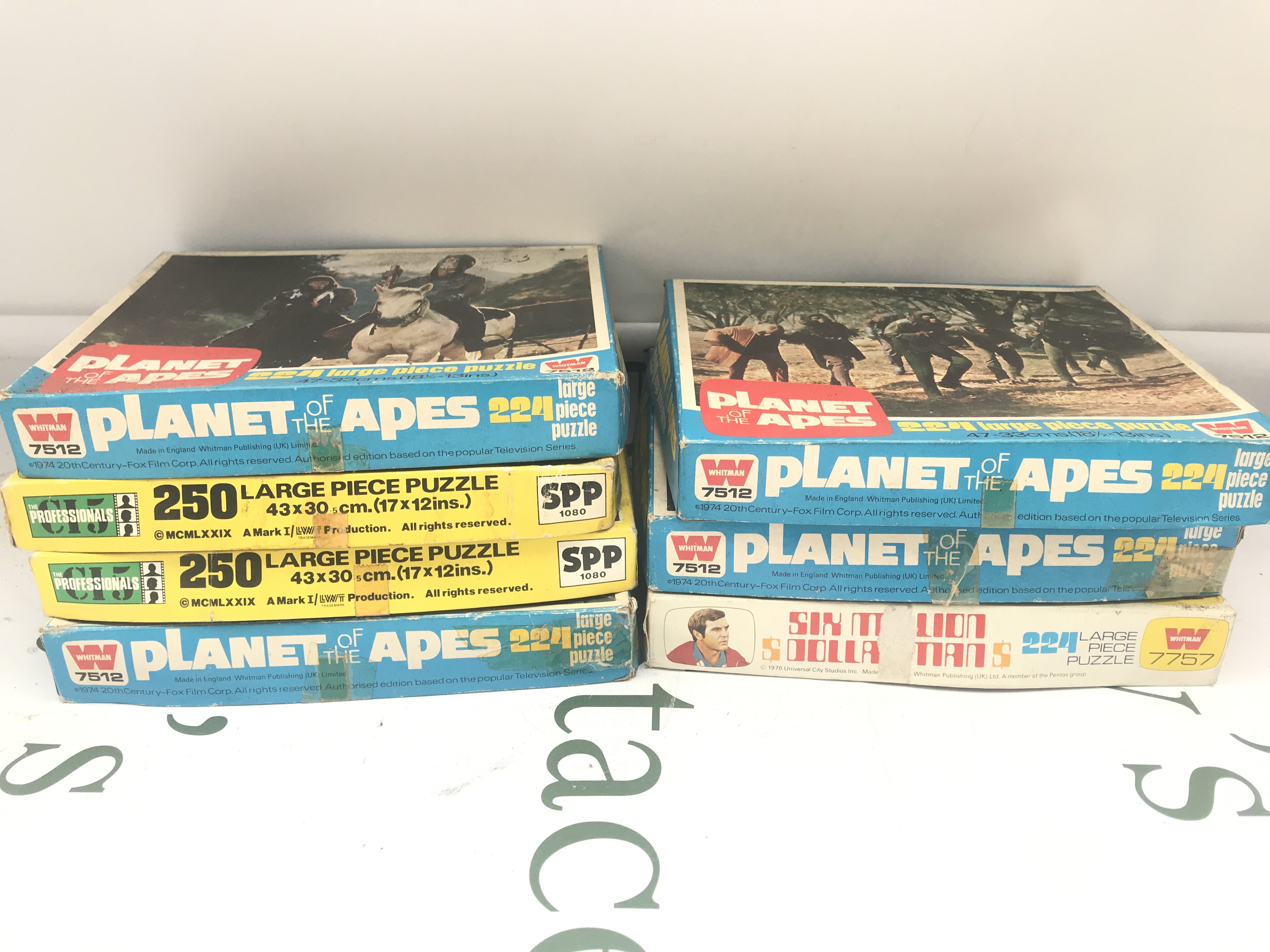 7 Boxed Jigsaw Puzzles. Planet Of The Aps. Six million Dollar Man And The Professionals. No Reserve.