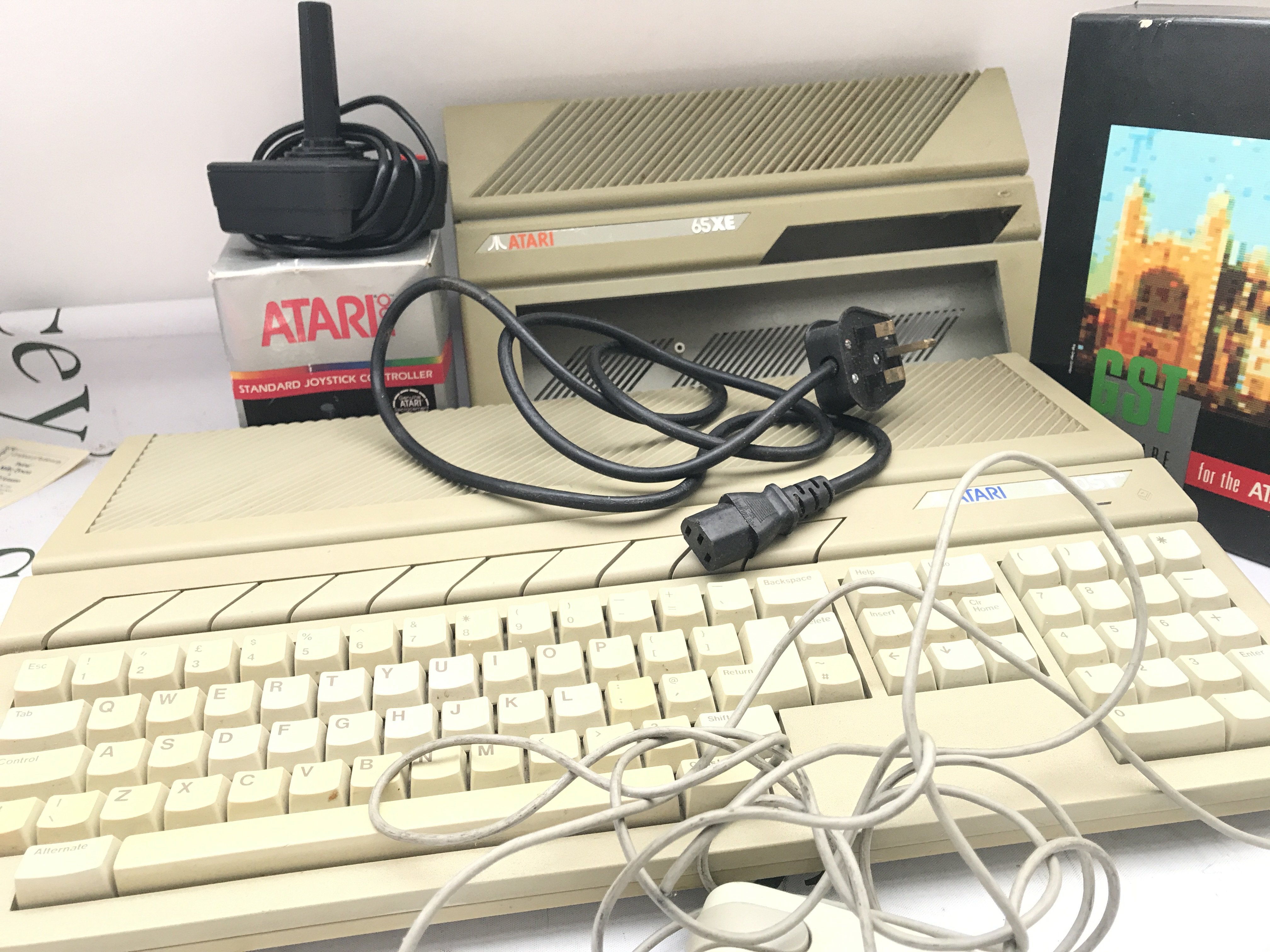 An Atari 1040ST With Joystick. Lead. Etc. Comes With Very Worn Box. No Resrve.