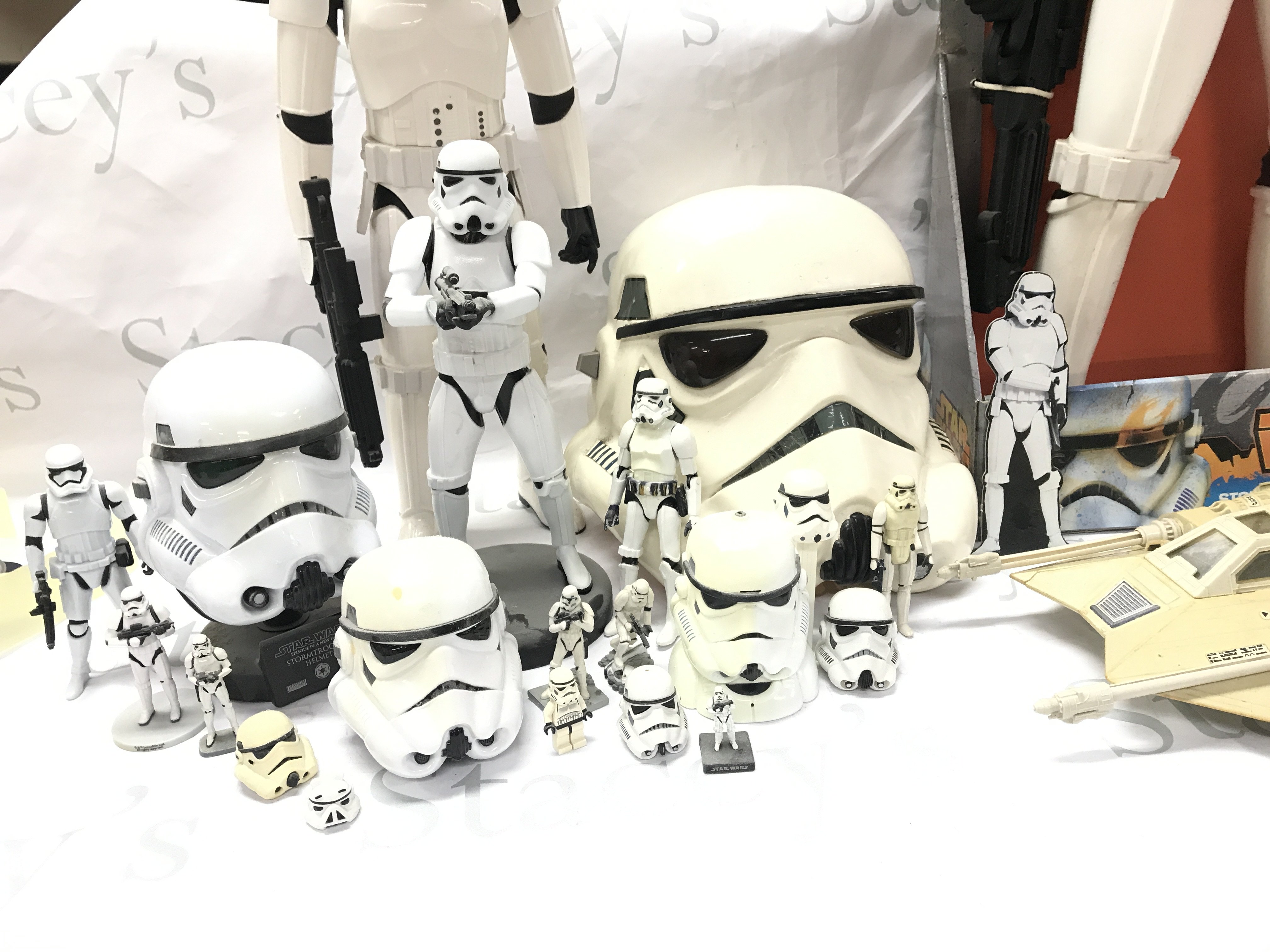 A Collection Of Star Wars Storm Trooper Figures including a 79Cm Figure. A Don Post Helmet And A Vintage Snow Speeder. No Reserve.(2).