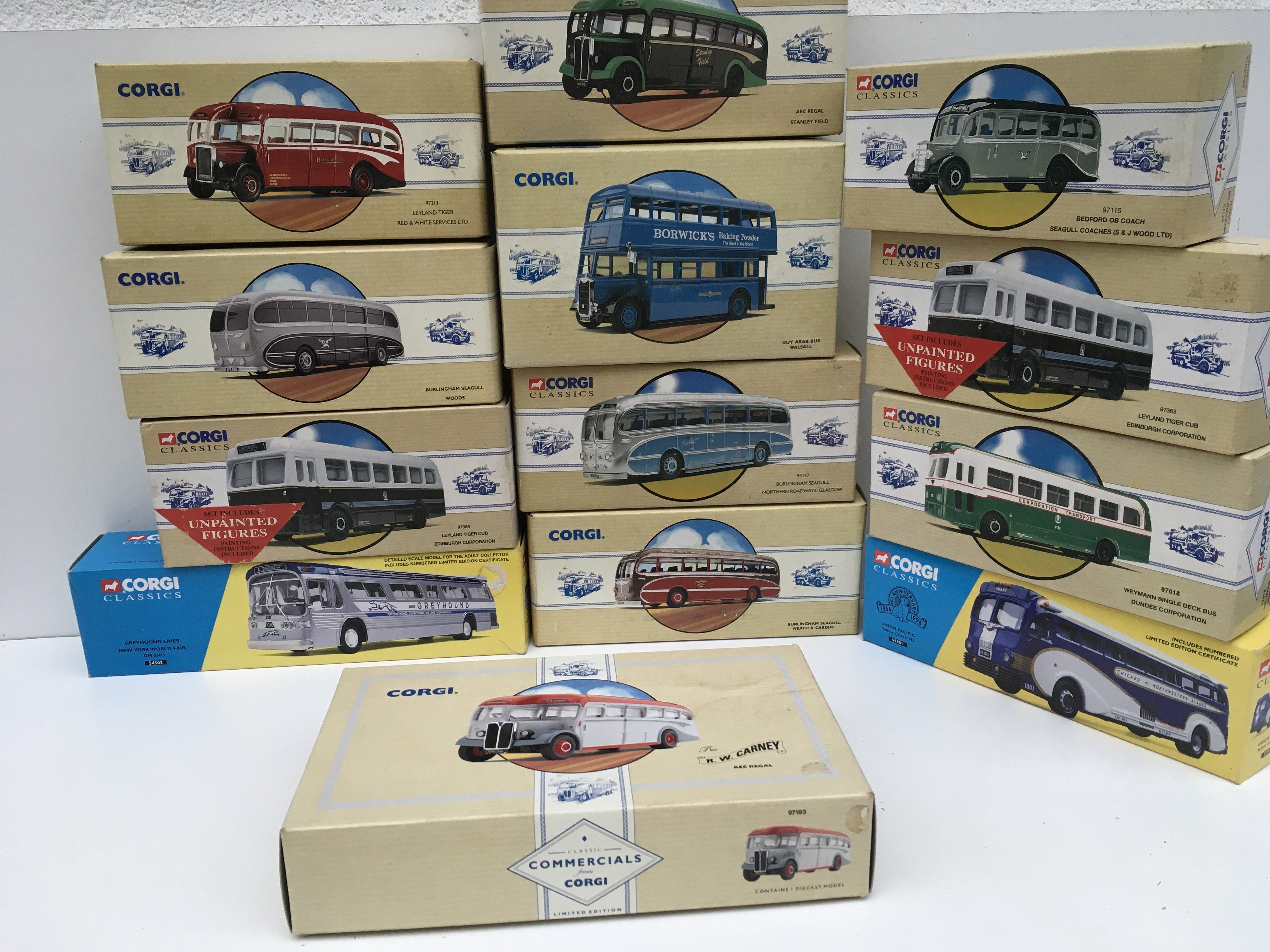 A collection of 13 boxed Corgi classics featuring buses and coaches. Some limited edition with COA. No reserve