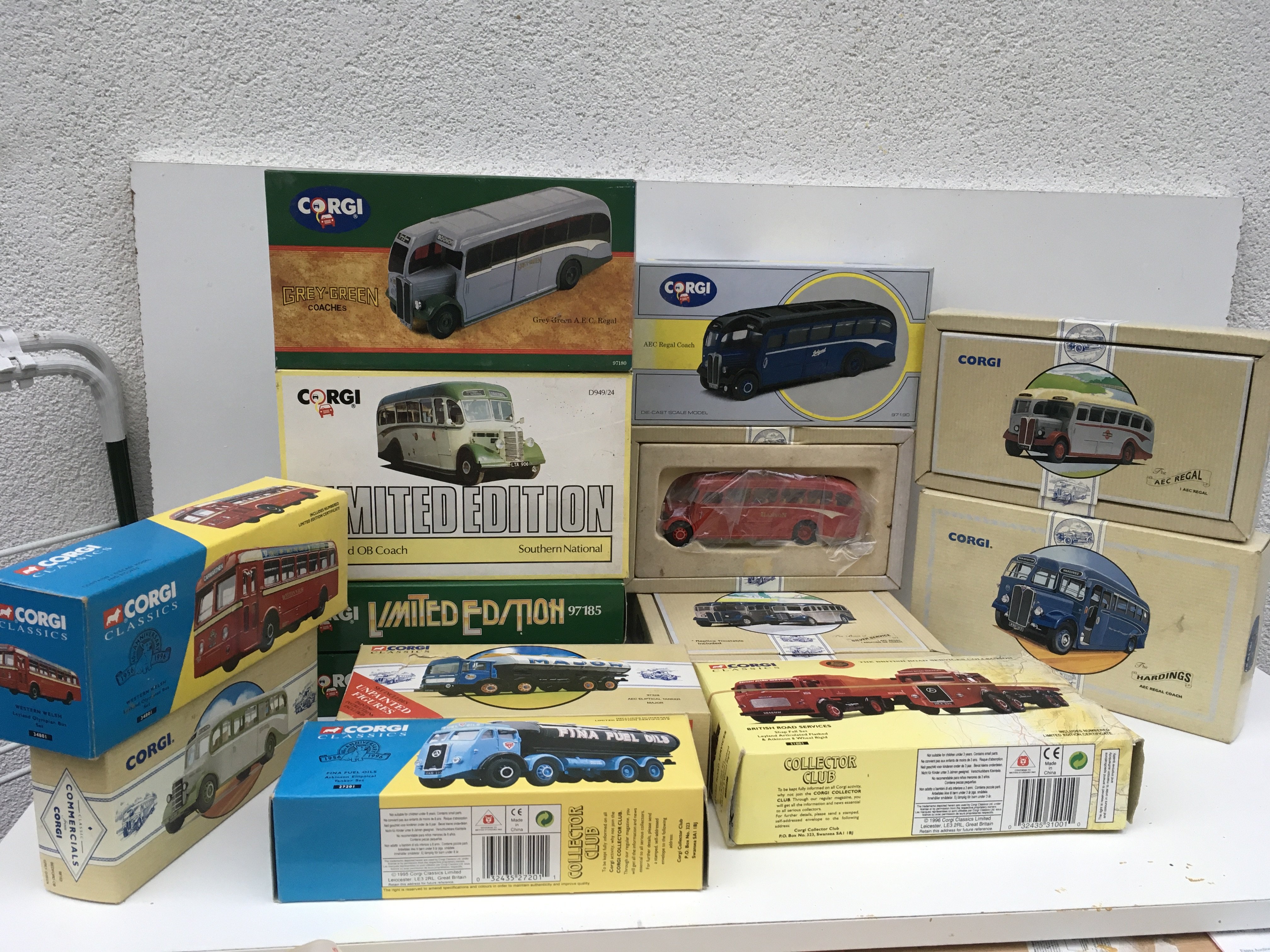 A collection of 14 boxed Corgi Classics featuring buses and commercials some limited edition withCOA. No reserve