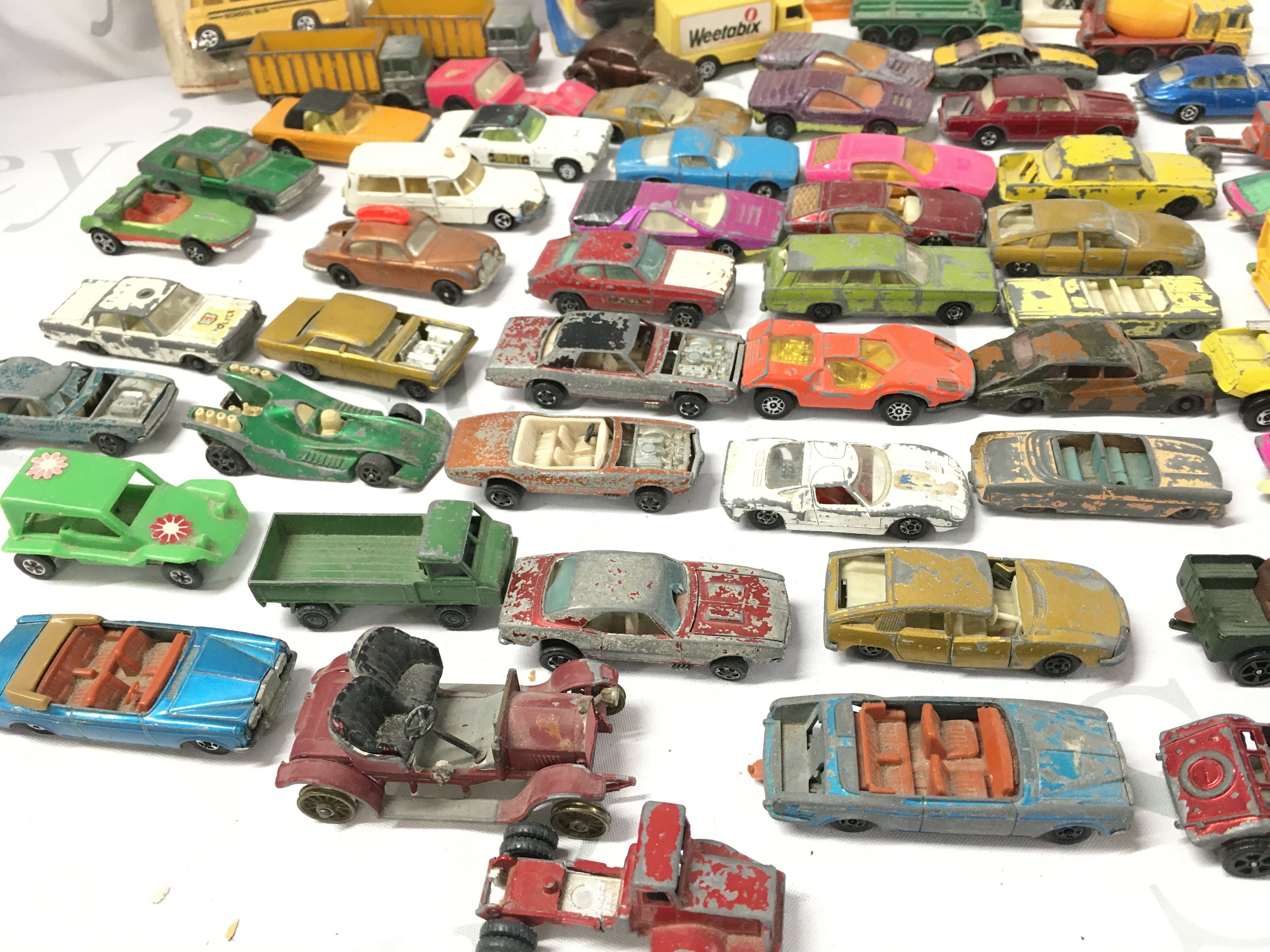 A Collection of Playworn Diecast Including 3 Carded Corgi Cars (Blisters have been opened)