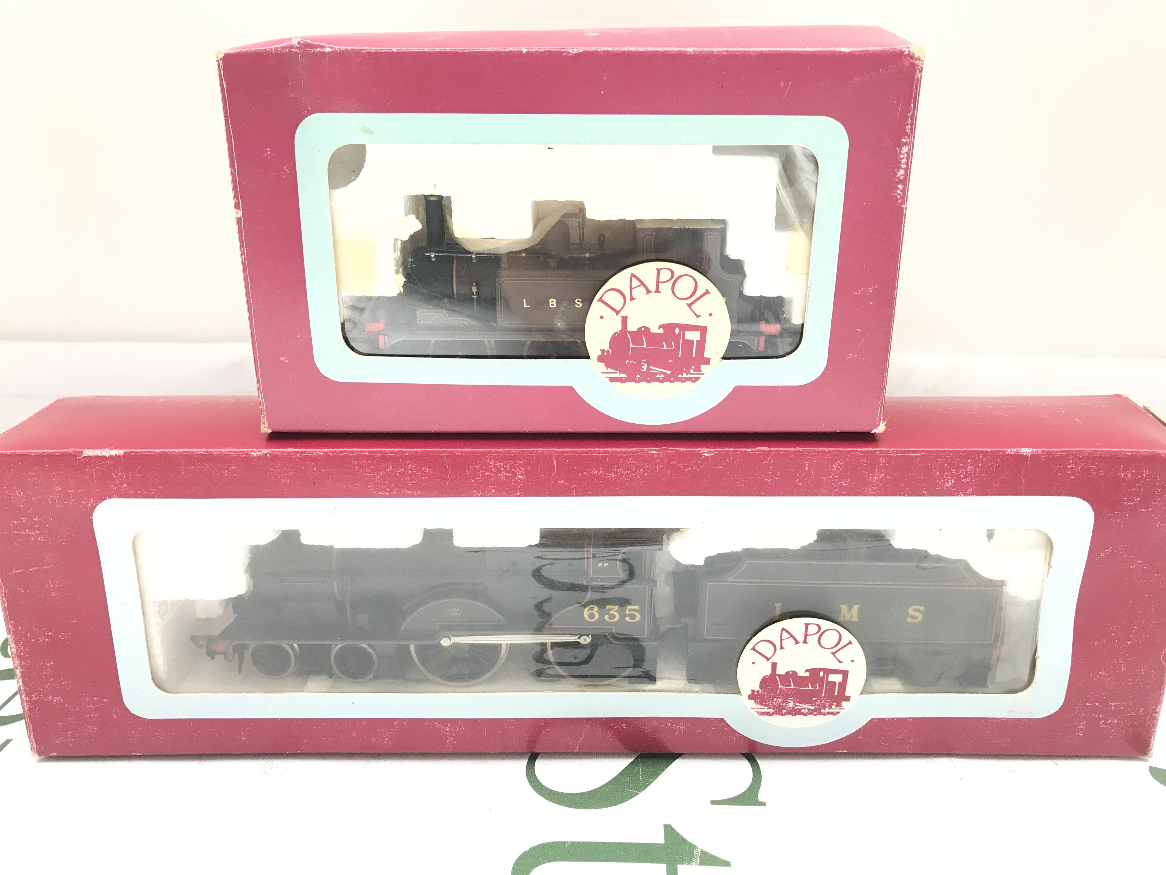 2 Boxed Dapol 00 Gauge Locomotives. A 0-6-0 Terrier And A D15 4-4-0 2p LMS Black. No Reserve.(2).