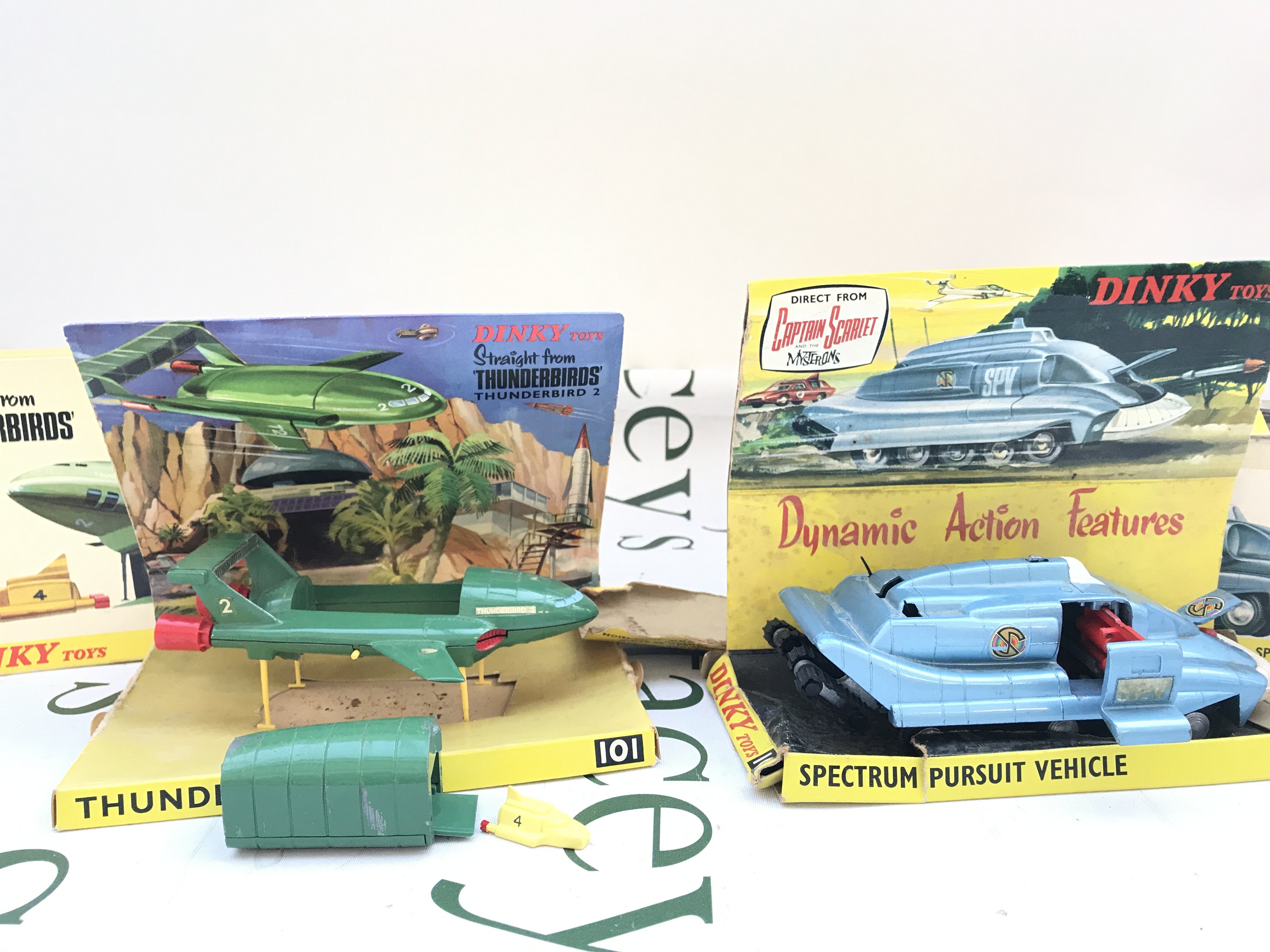 A Boxed Dinky Thunderbird 2 #101 And A Spectrum Pursuit Vehicle #104. Boxes Are Worn. Vehicles Are Playworn.