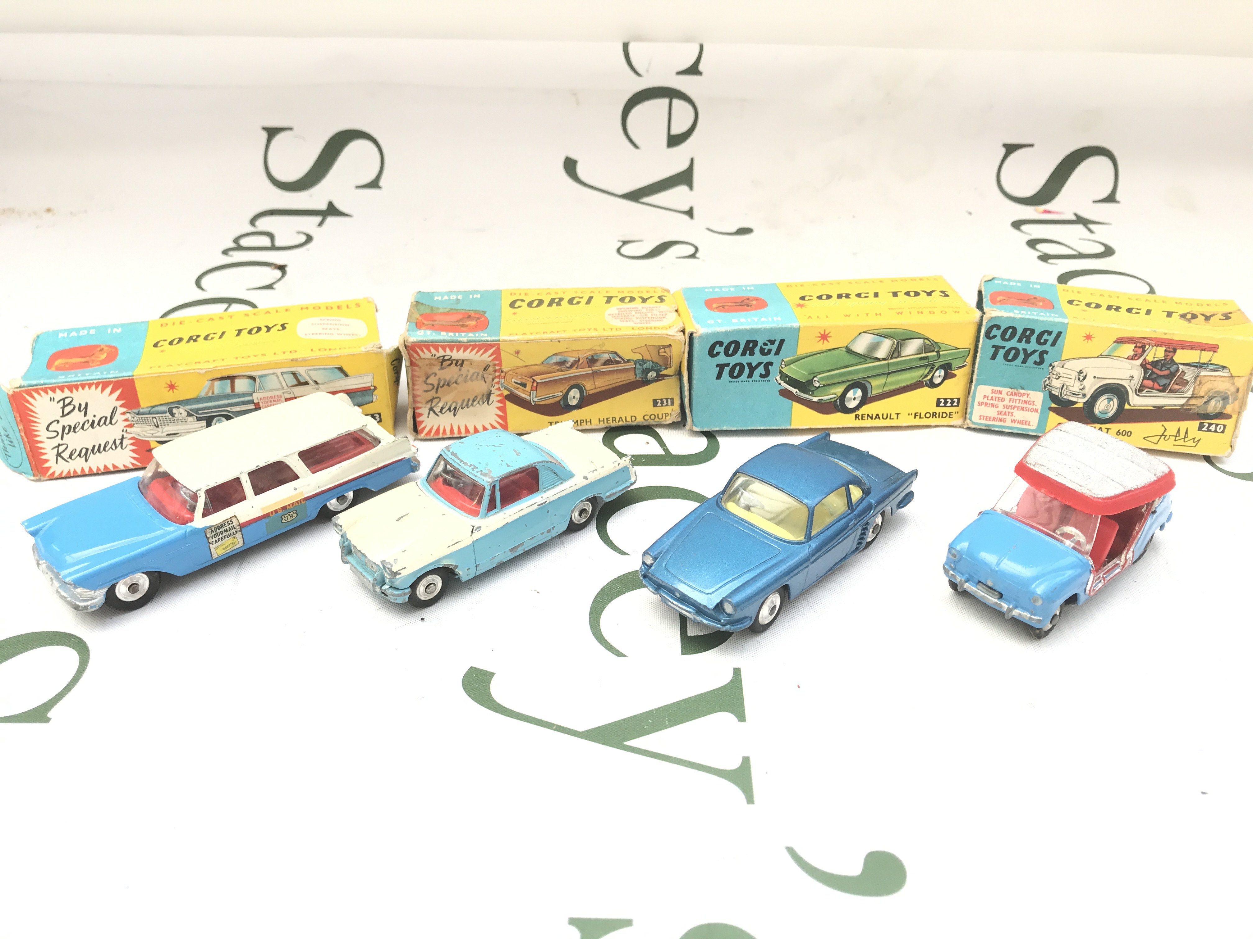 4 X Boxed Corgi Vehicles. A Plymouth-U.S. Mail #443 A Triumph Hearld Coupe #231. A Renault Floride #222 An Ghia-Fiat 600 #240. Boxes Are Worn.