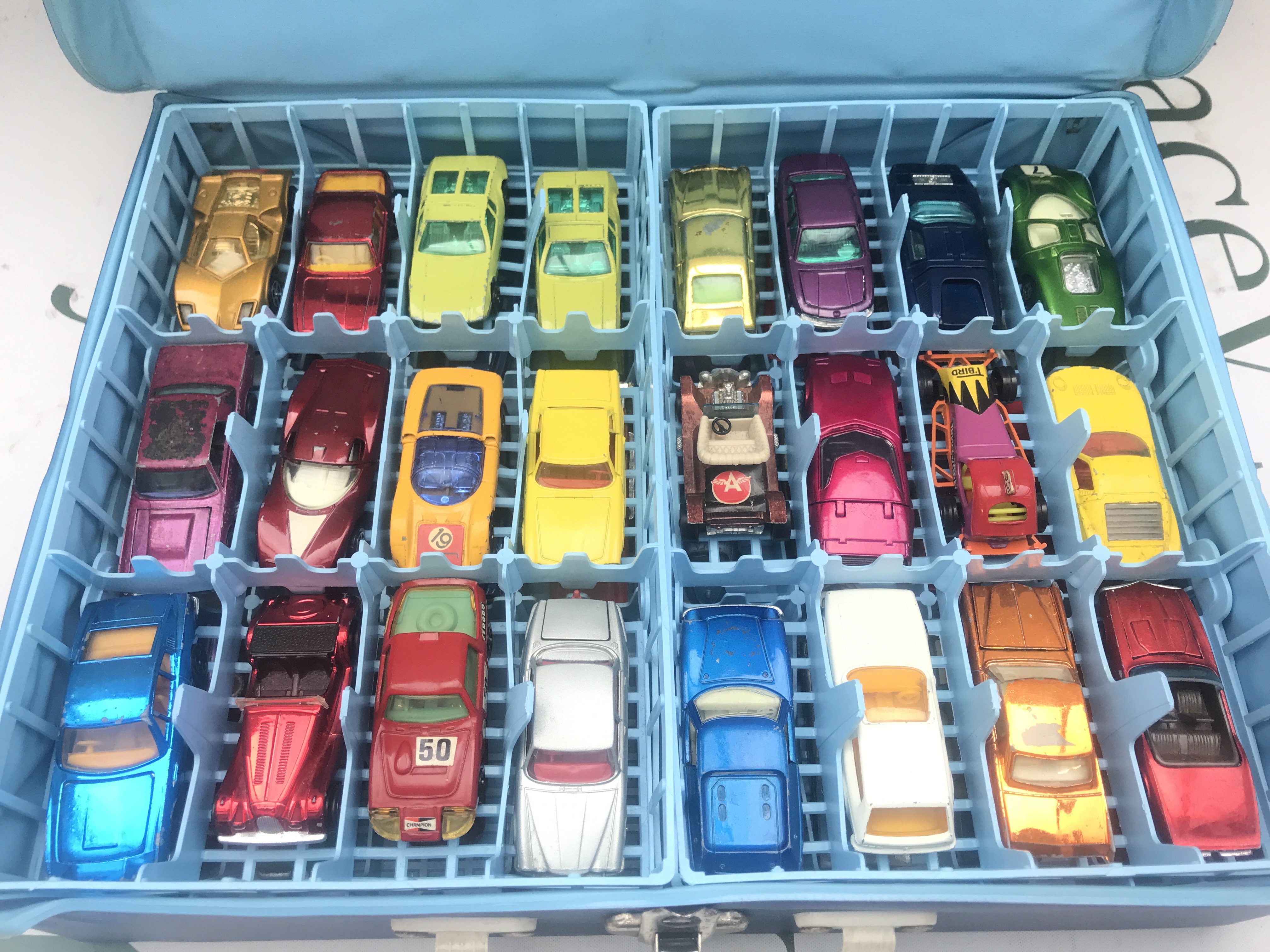 A Matchbox Carry Case Containing A Collection Of Diecast Including Husky. Corgi. Matchbox.