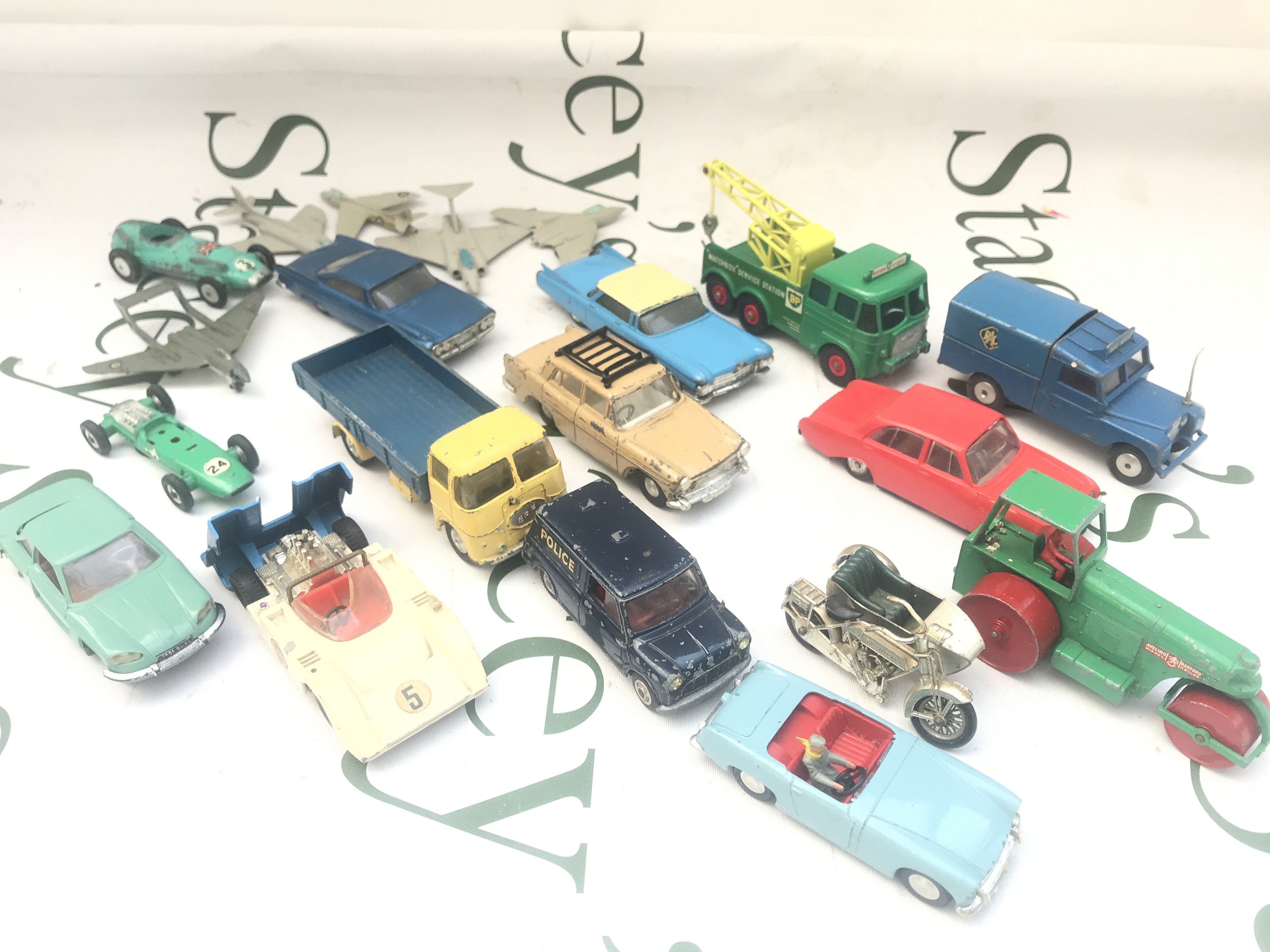 A Small Collecrion Of Playworn Plastic and Diecast.