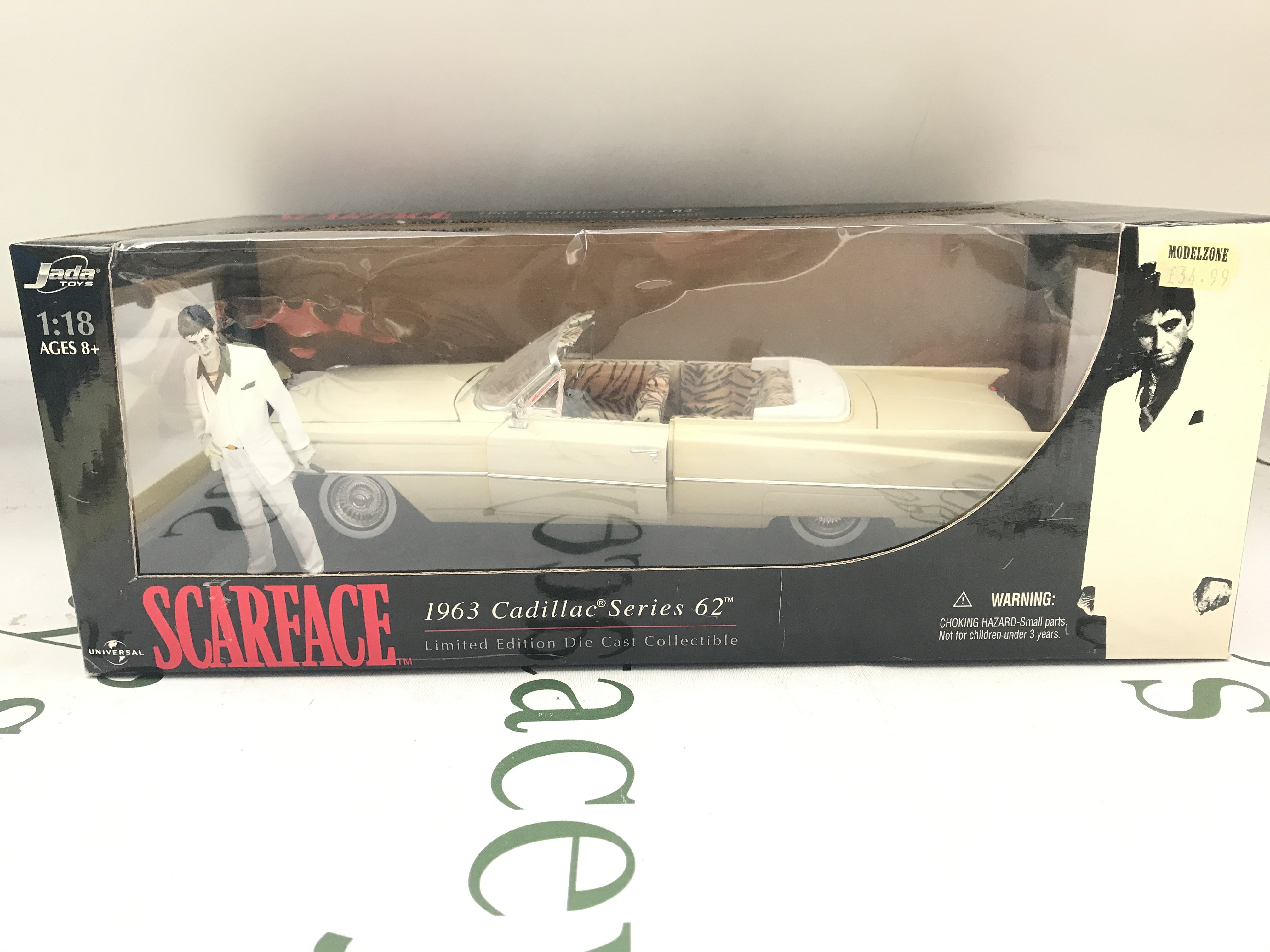 A Boxed Jada Toys Scarface 1963 Cadillac Series 62 1/18 Scale.
