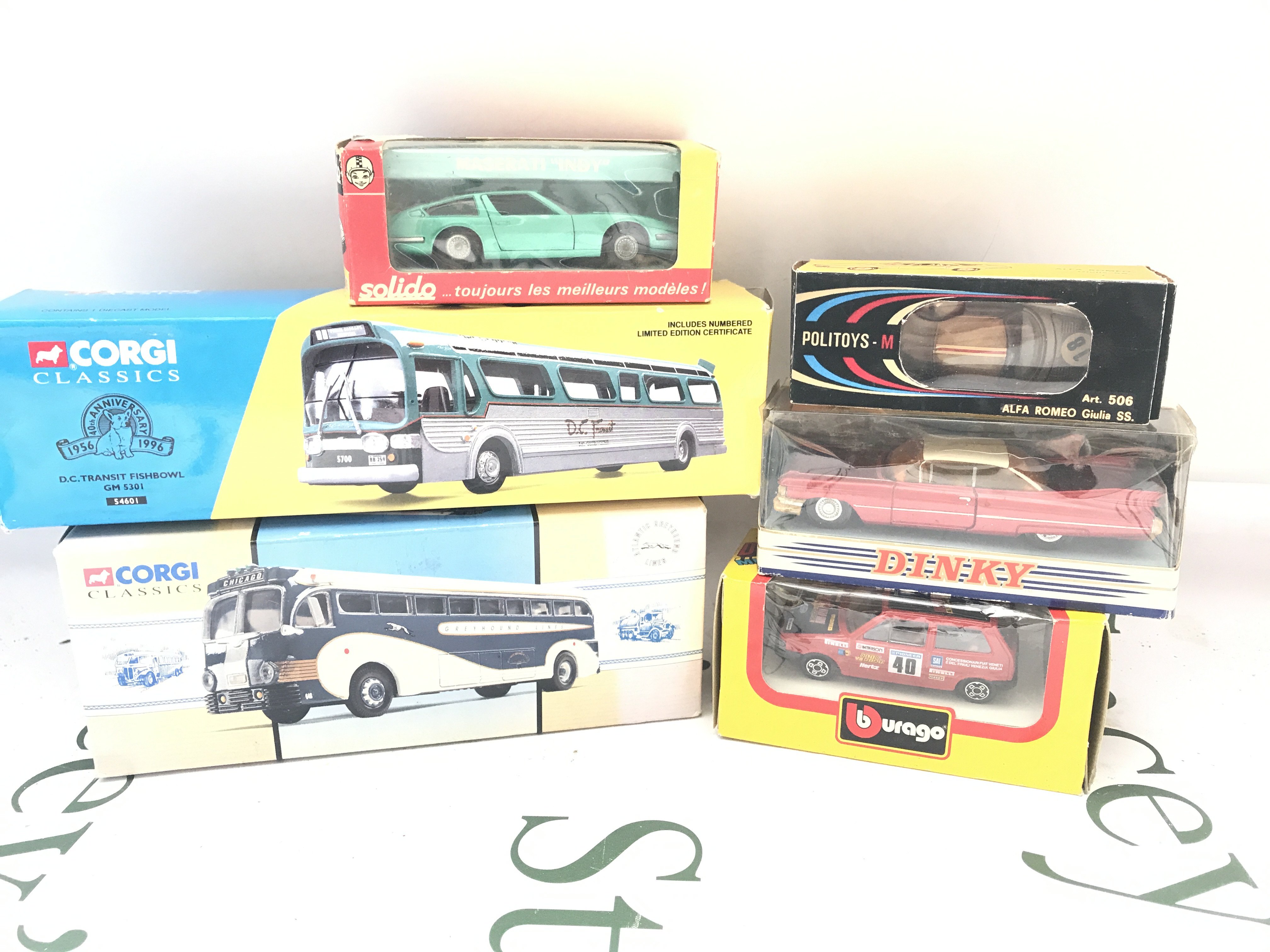 A Box Containing Boxed And Loose Diecast Including Empty Boxes. No Reserve.