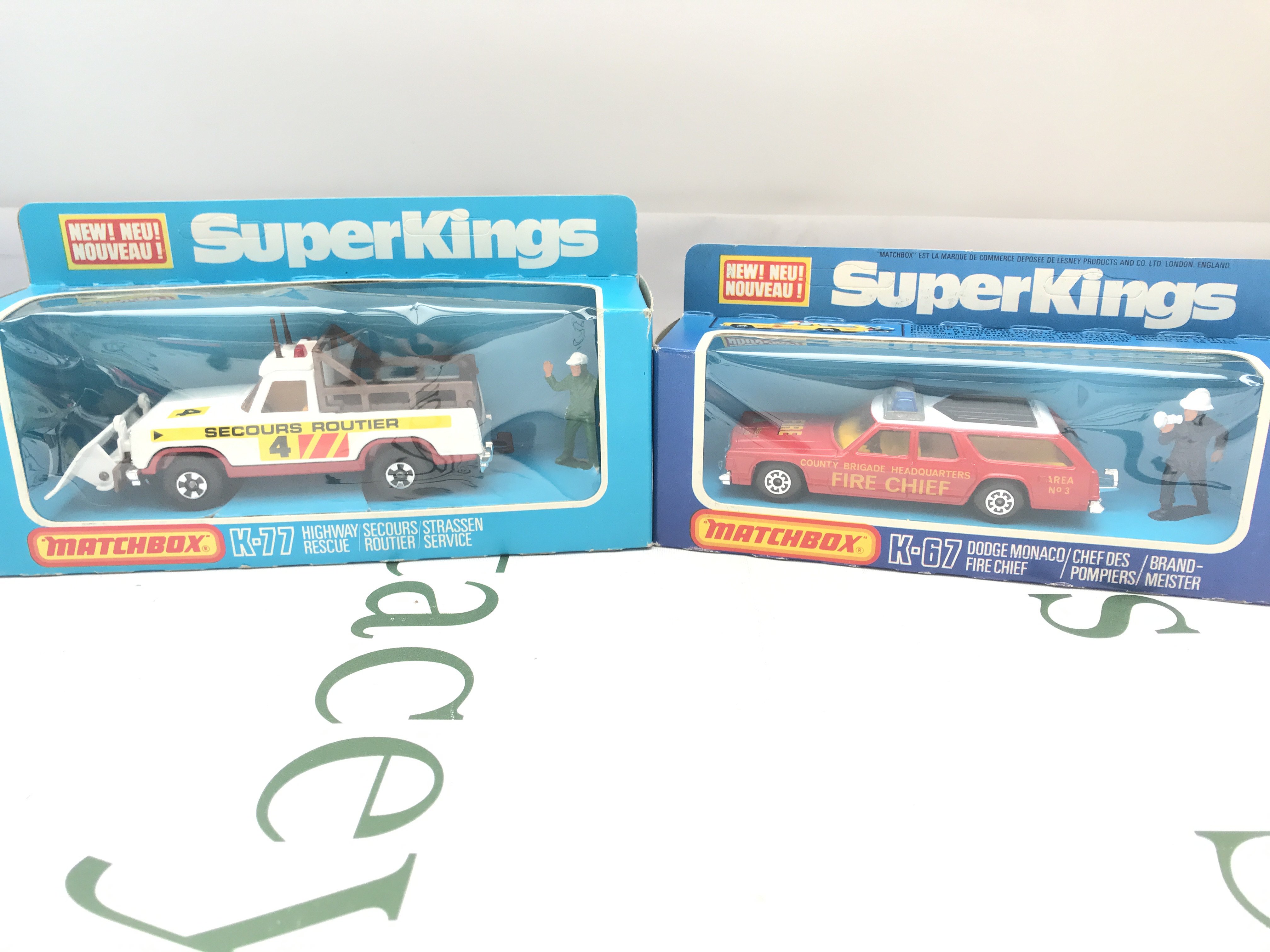 2 X Boxed Matchbox Vehicles. A Highway Rescue #K-77 And A Dodge Monaco Fire Chief #K-67.