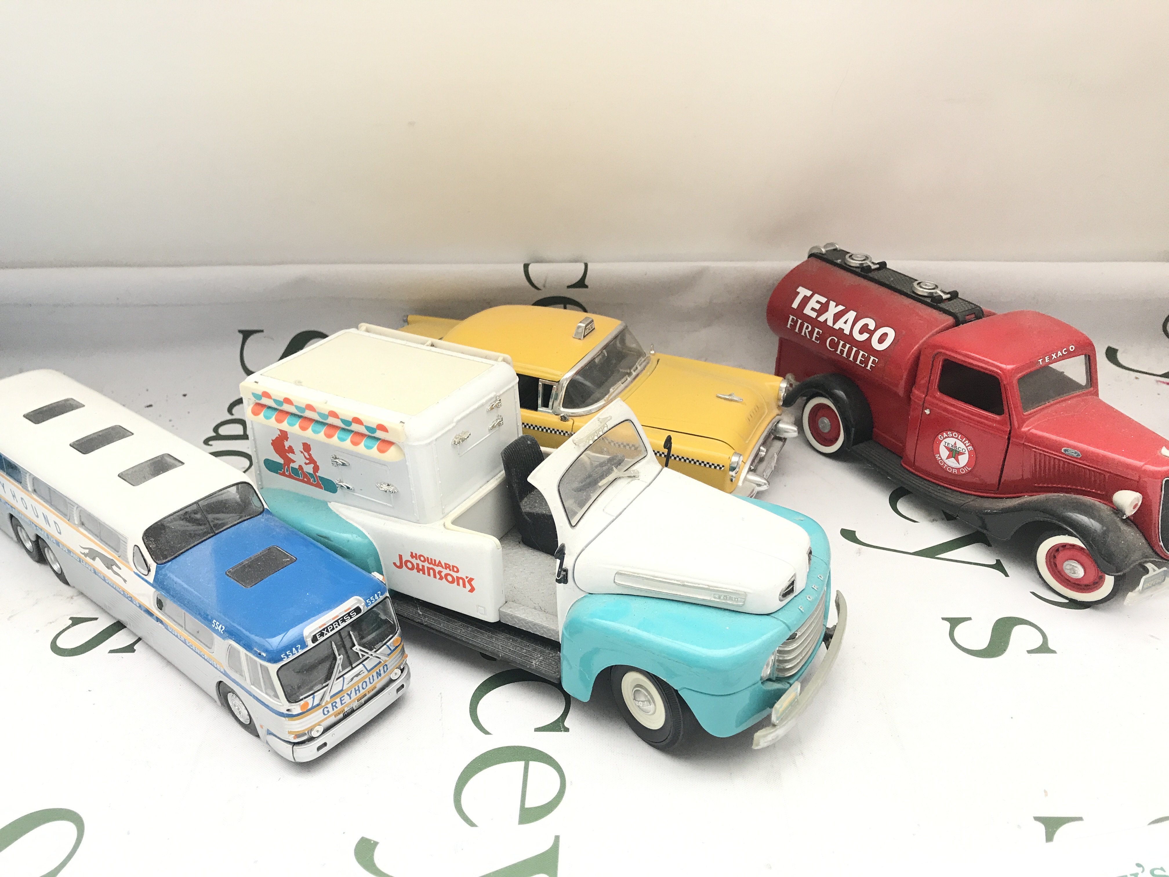 A Box Containing Various Diescast including 1/18 Scale. No Rrserve.