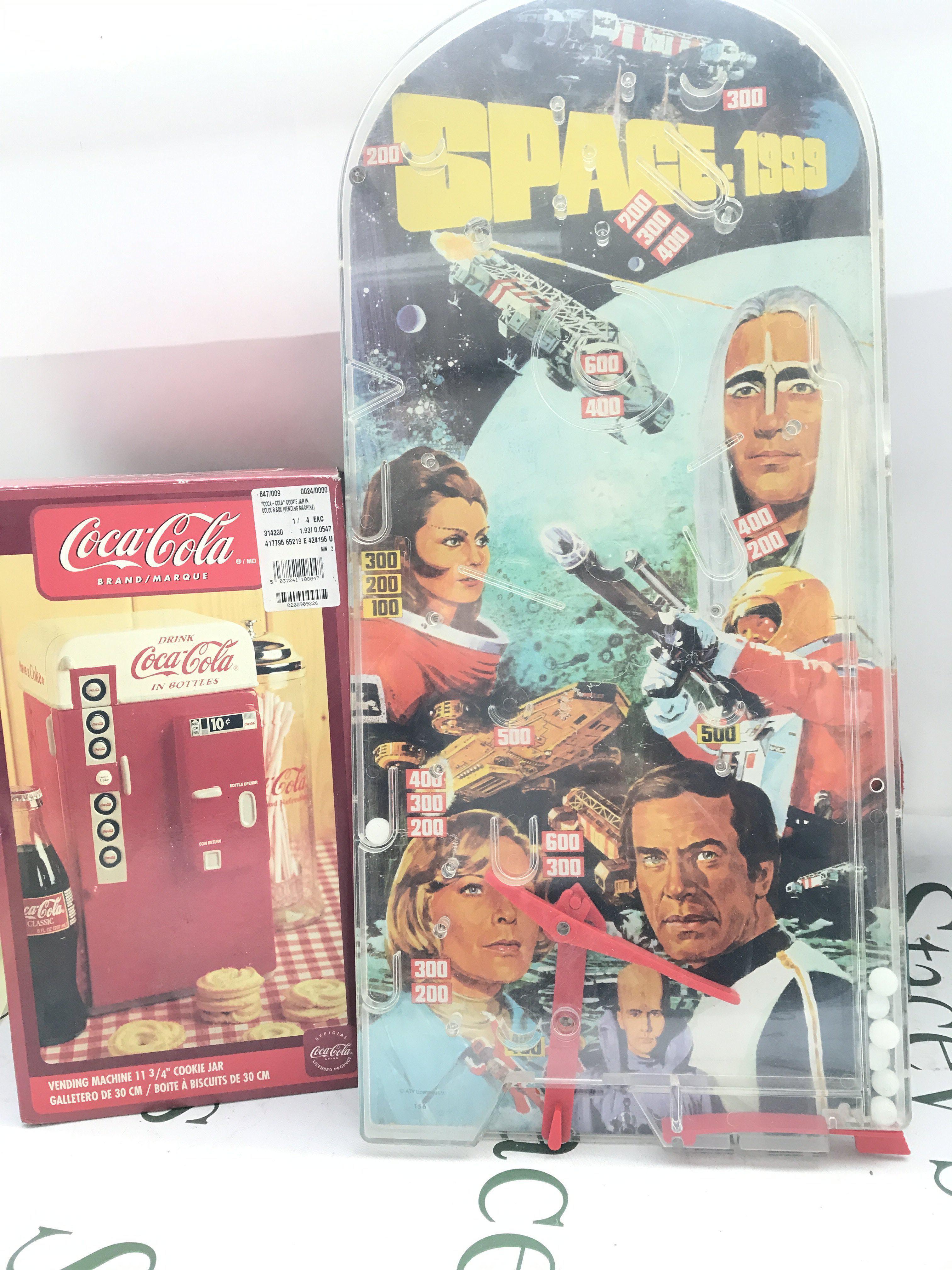 A Collection of Various Toys Including A Boxed K-9 (Box Is Worn). A Space 1999 Bagatelle Pinball. An Early Etch-A-Scetch Etc.