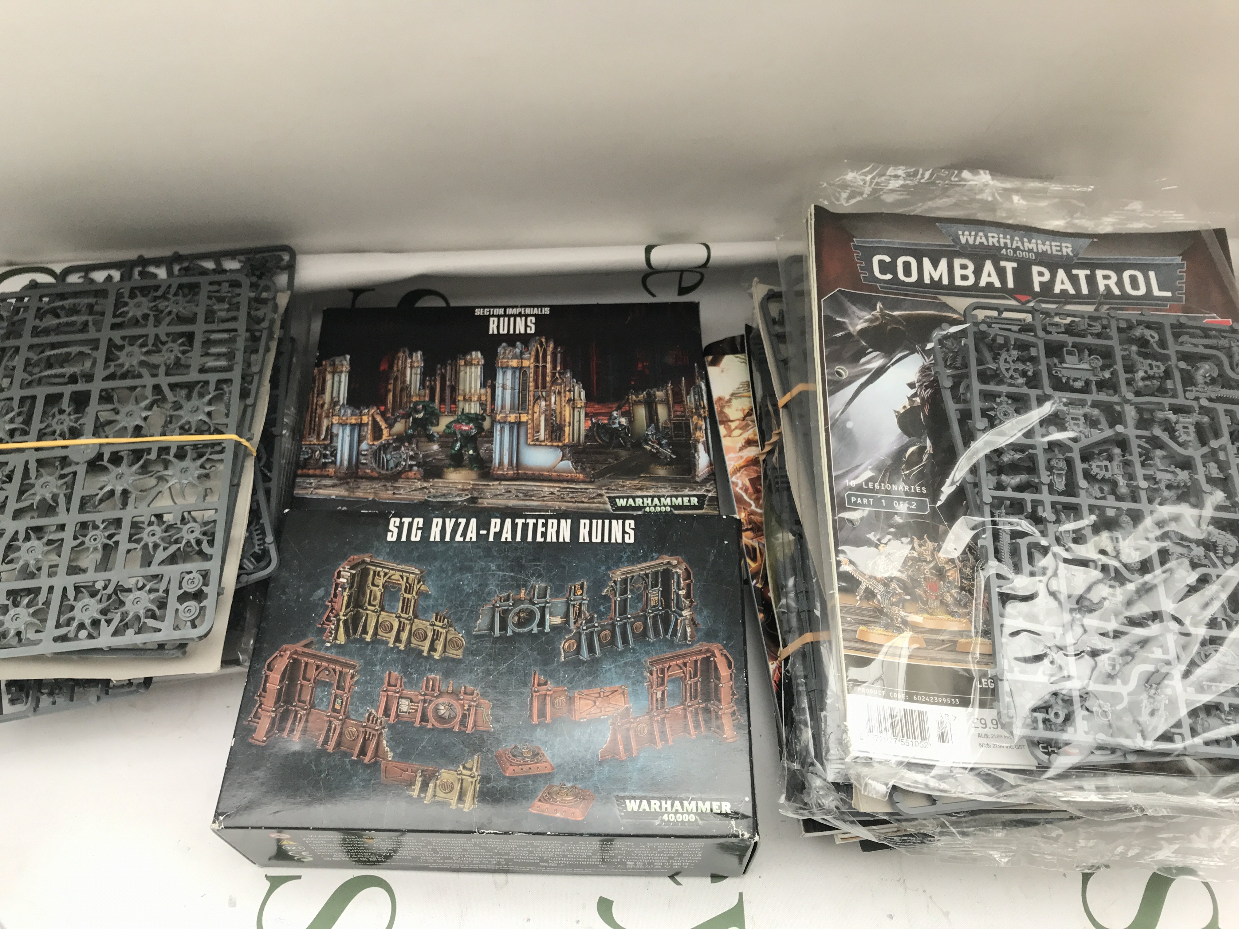 A Collection Of Warhammer Model Kits And Magazines. No Reserve.