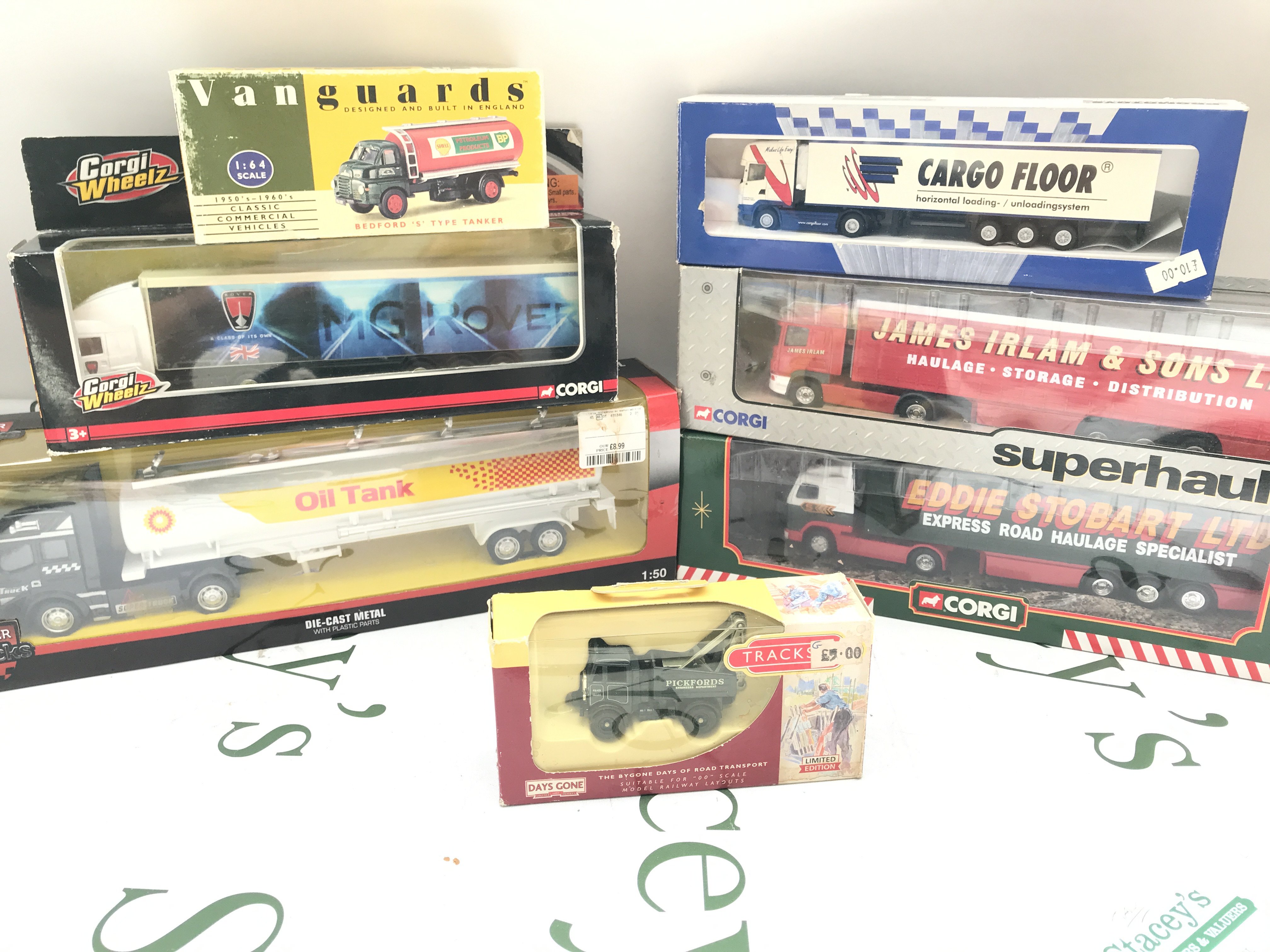 A Box Containing Various Boxed And Loose Diecast. No Reserve.