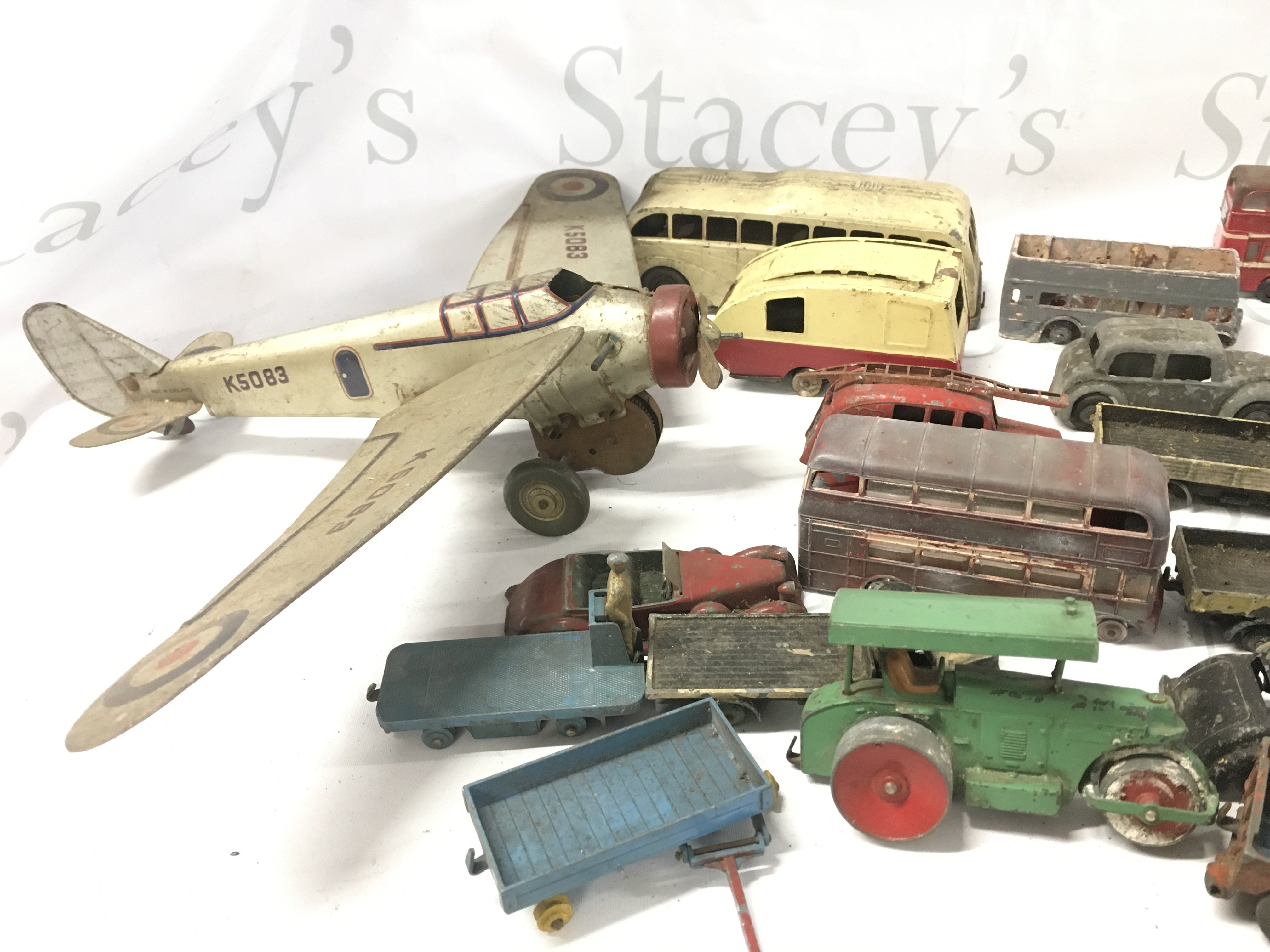 A Collection of Playworn Diecast And Tin Plate Plane.