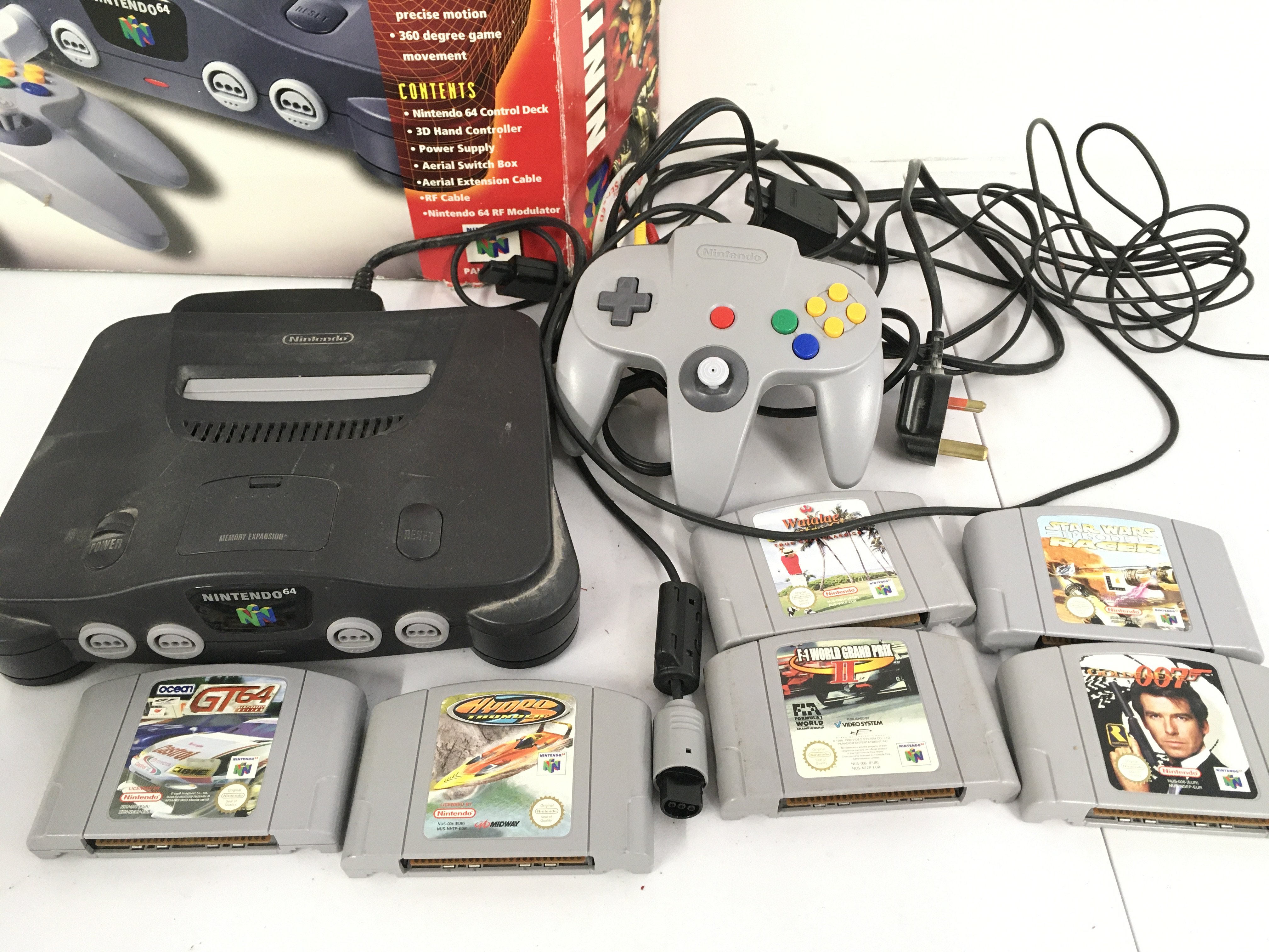 A Boxed Nintendo 64 With A 6 Games. Box Is Worn. No Reserve