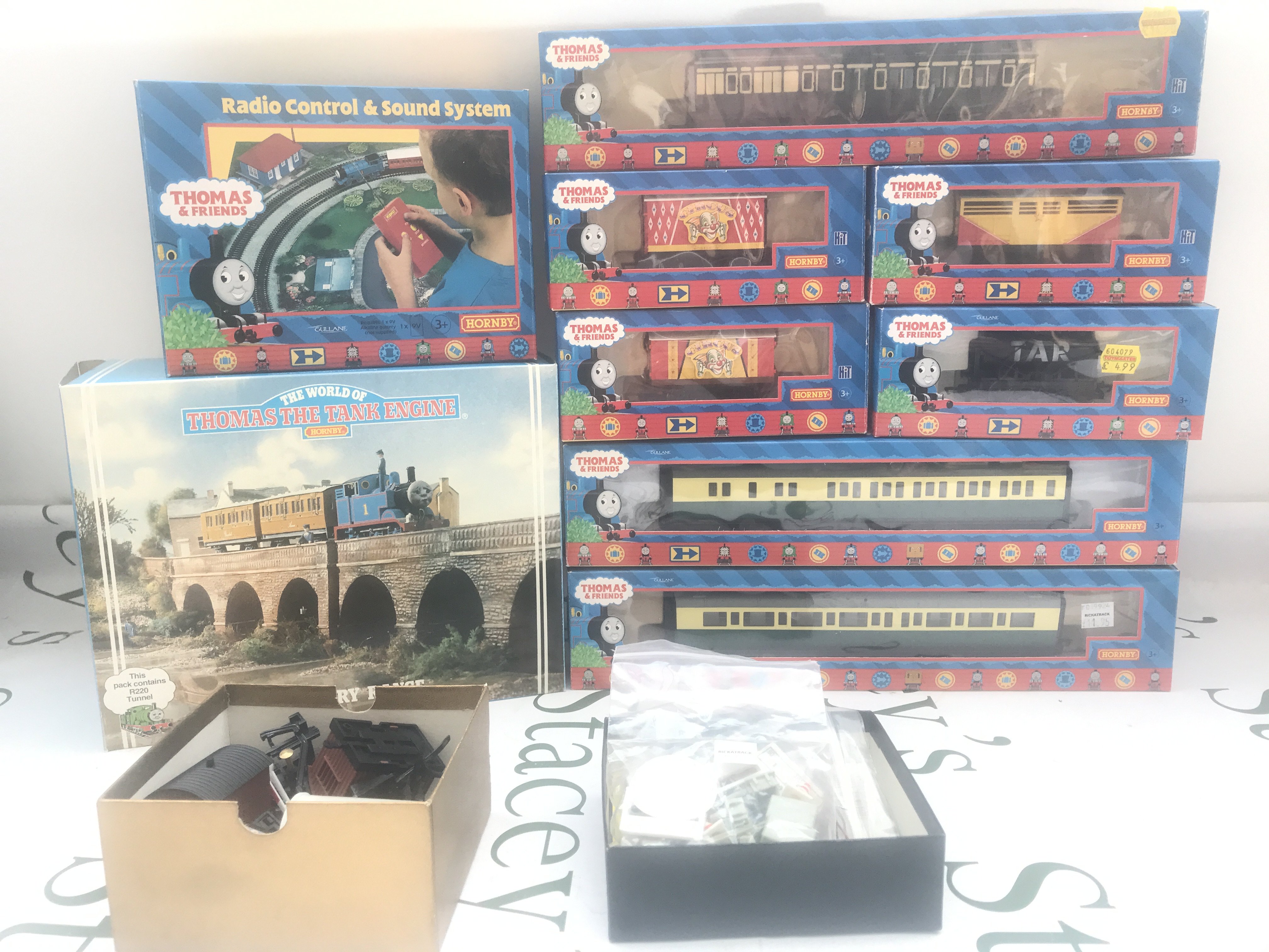 A Collection Of Boxed Hornby Thomas And Friends Boxed Coaches. Wagons And Some Accessories. (Sound System Has Parts Missing). No Reserve.