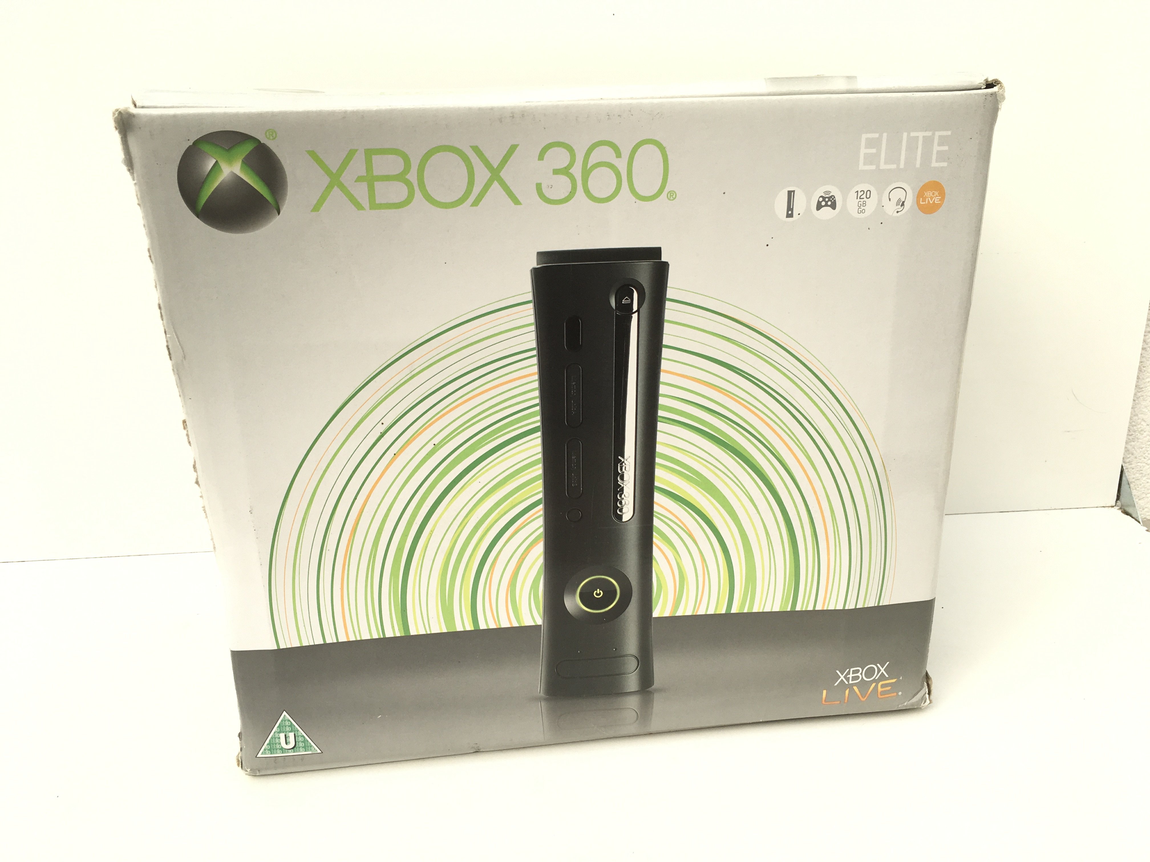 A boxed XBOX 360. Elite- includes power supply - manuals and various cables. No reserve