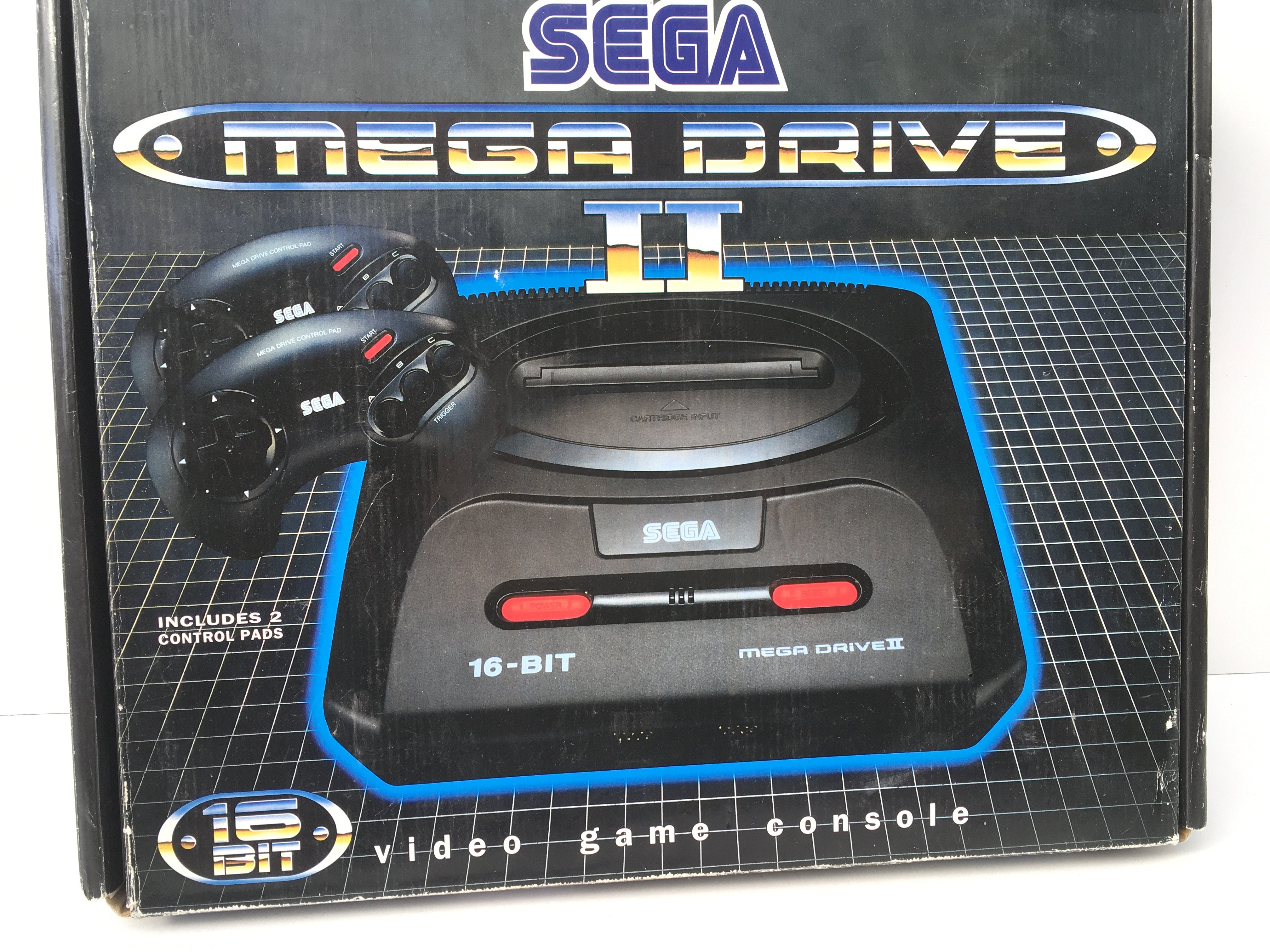 A boxed SEGA Mega Drive II. 16 bit video game console. Includes power supply. Controller and cables. No reserve