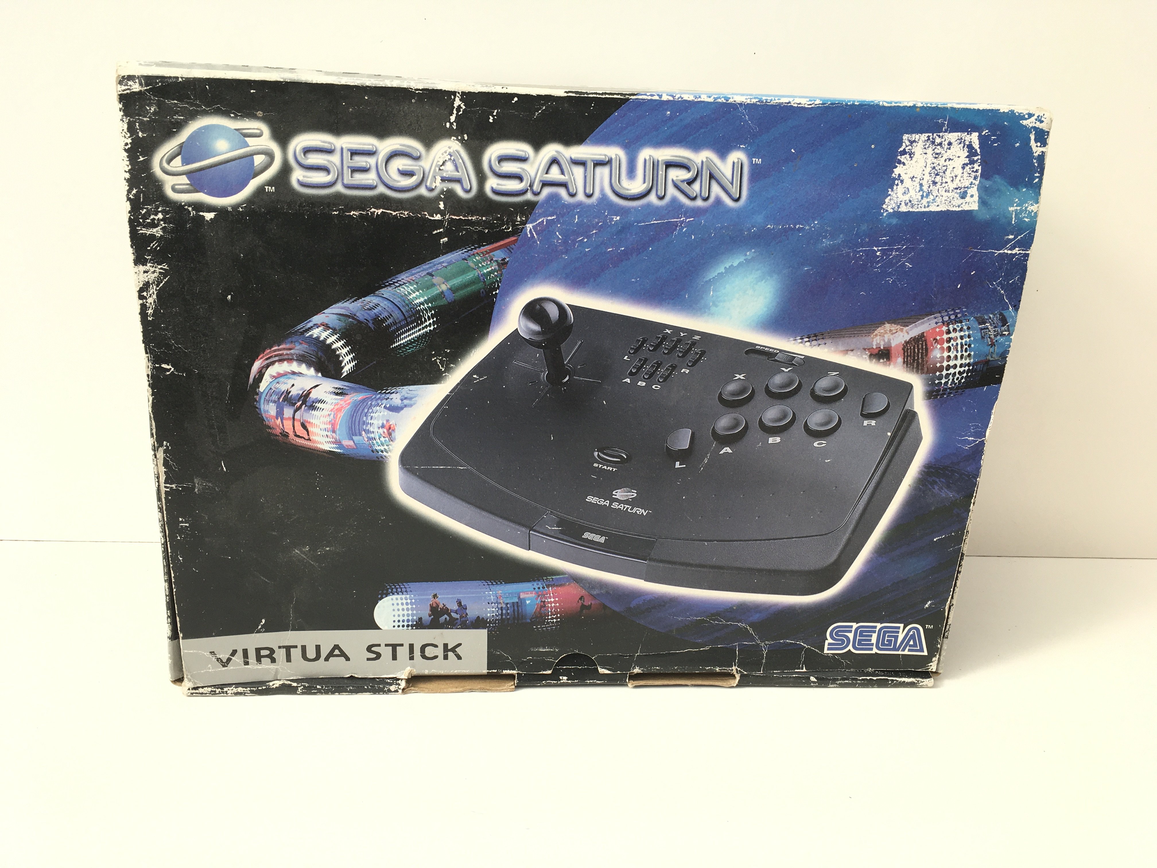 A boxed SEGA SATURN Virtua Stick. No reserve
