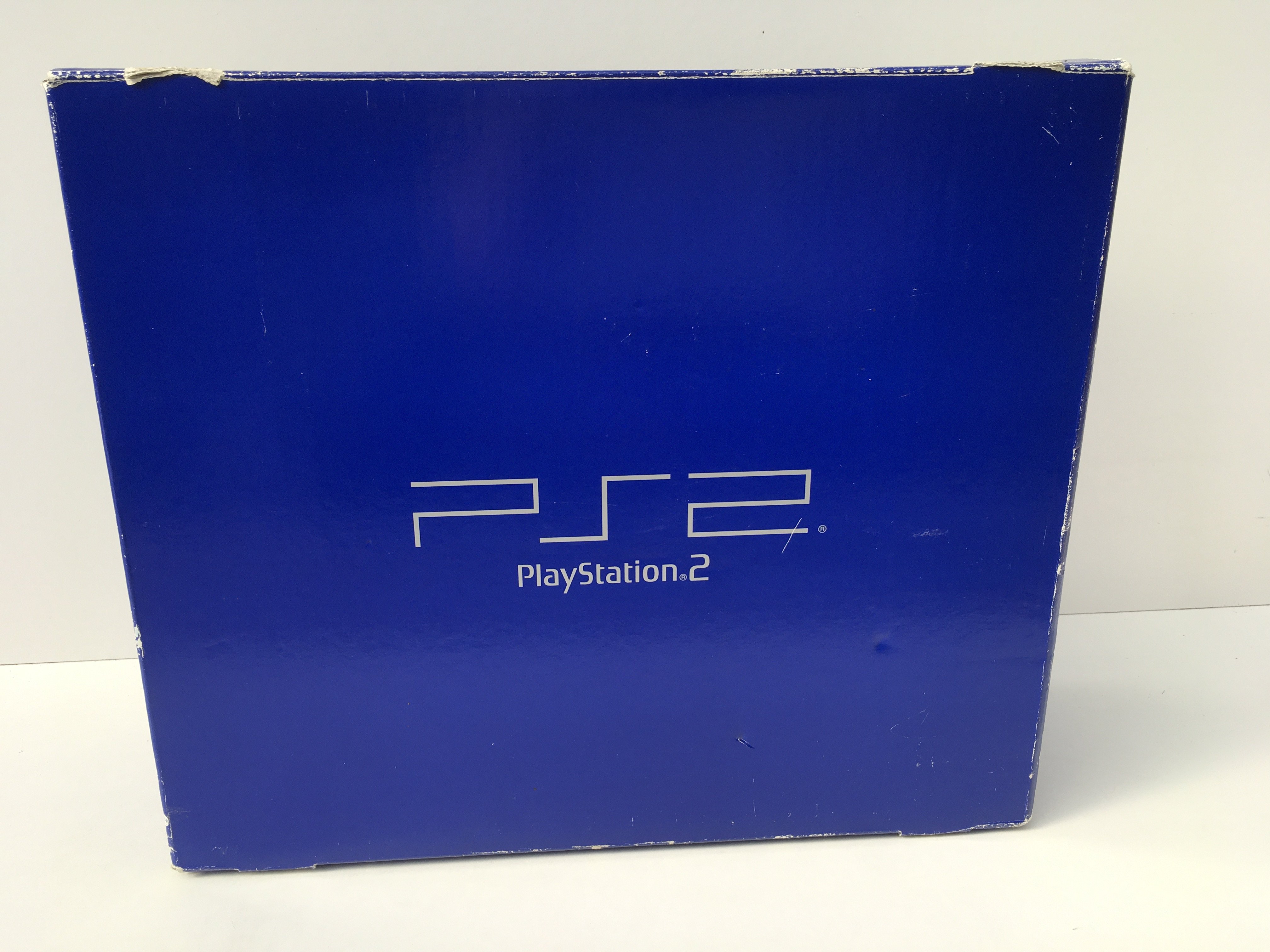 A boxed PlayStation 2. PS2. Includes controller..manuals..cable..memory cards and demo disc. No reserve