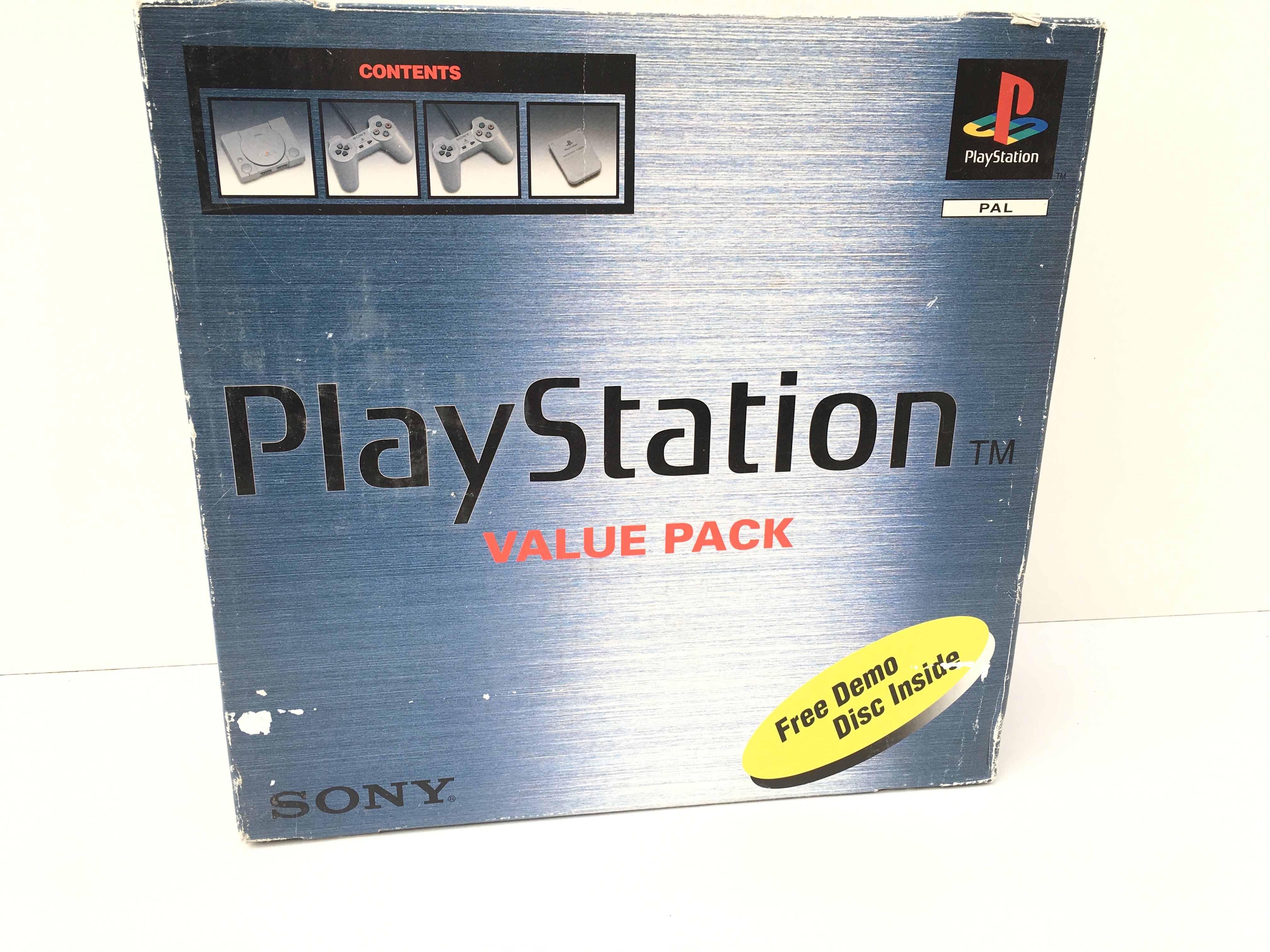 A boxed Sony PlayStation console. Includes cable. No reserve