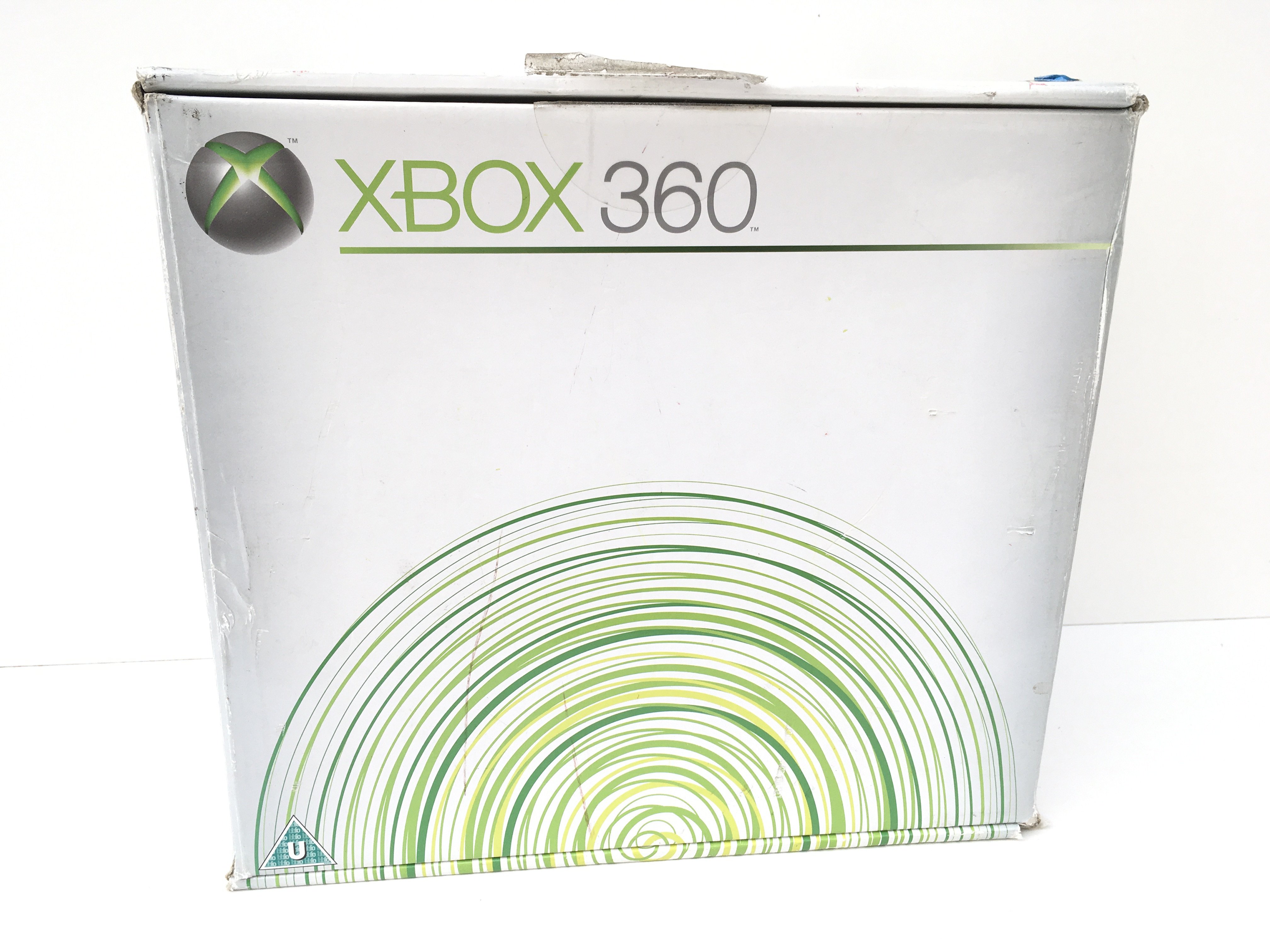 A boxed XBOX 360. Includes manuals and a cable. No reserve